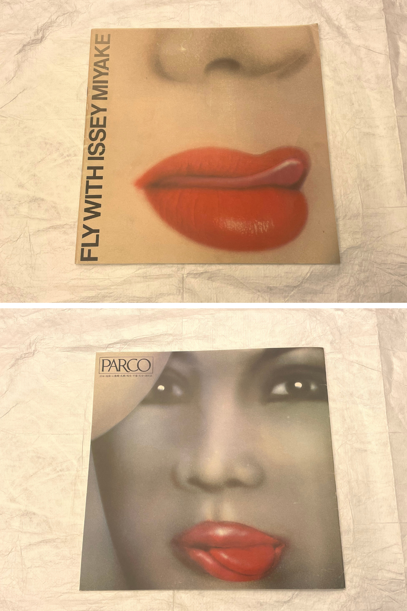 Two pamphlets featuring lips with bright red lipstick