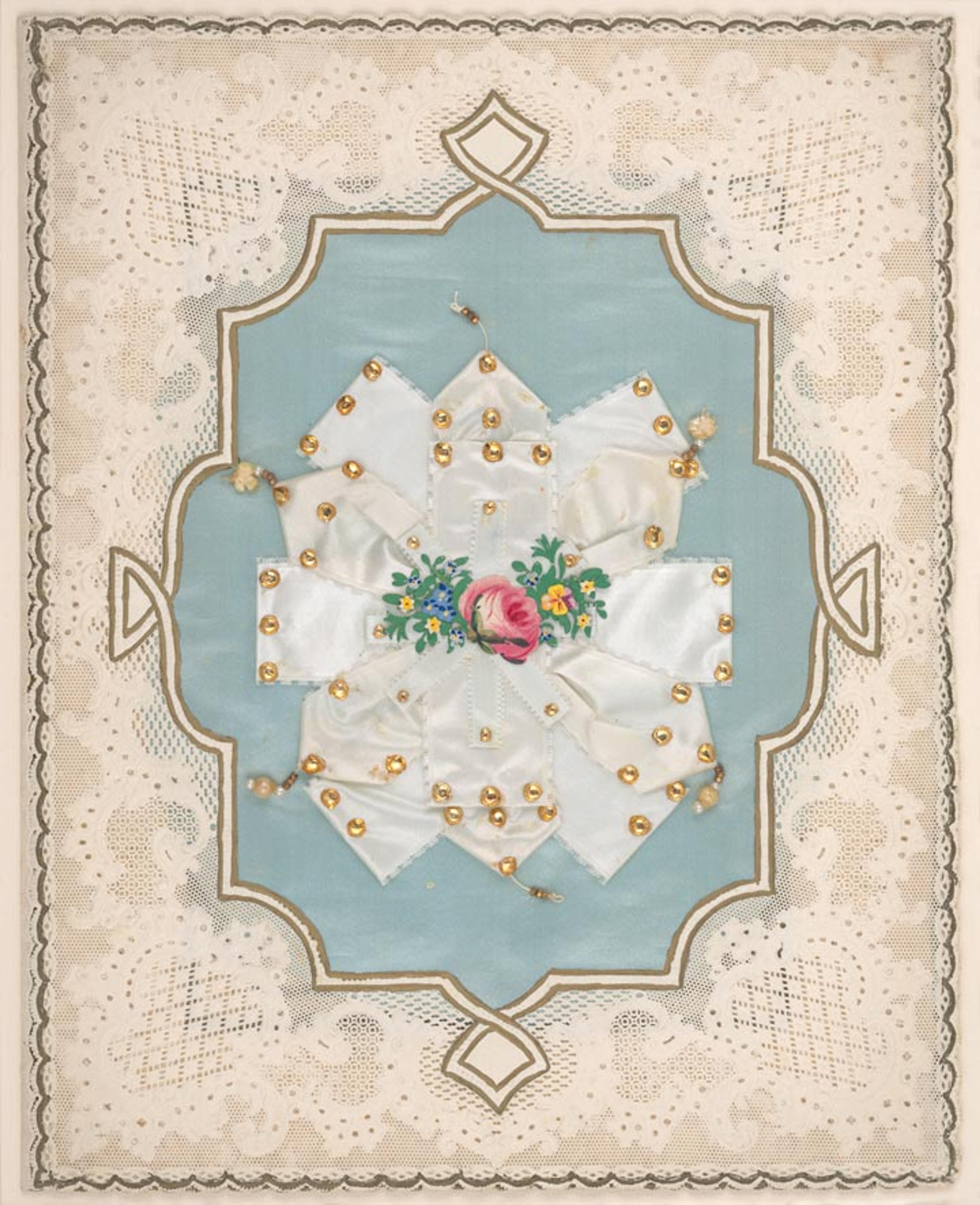 A 19th-century American lace-paper valentine with a blue-stain center adorned with faux pearls and a floral motif