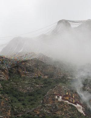 Prayer flags above the Drak Yerpa monastery outside of Lhasa