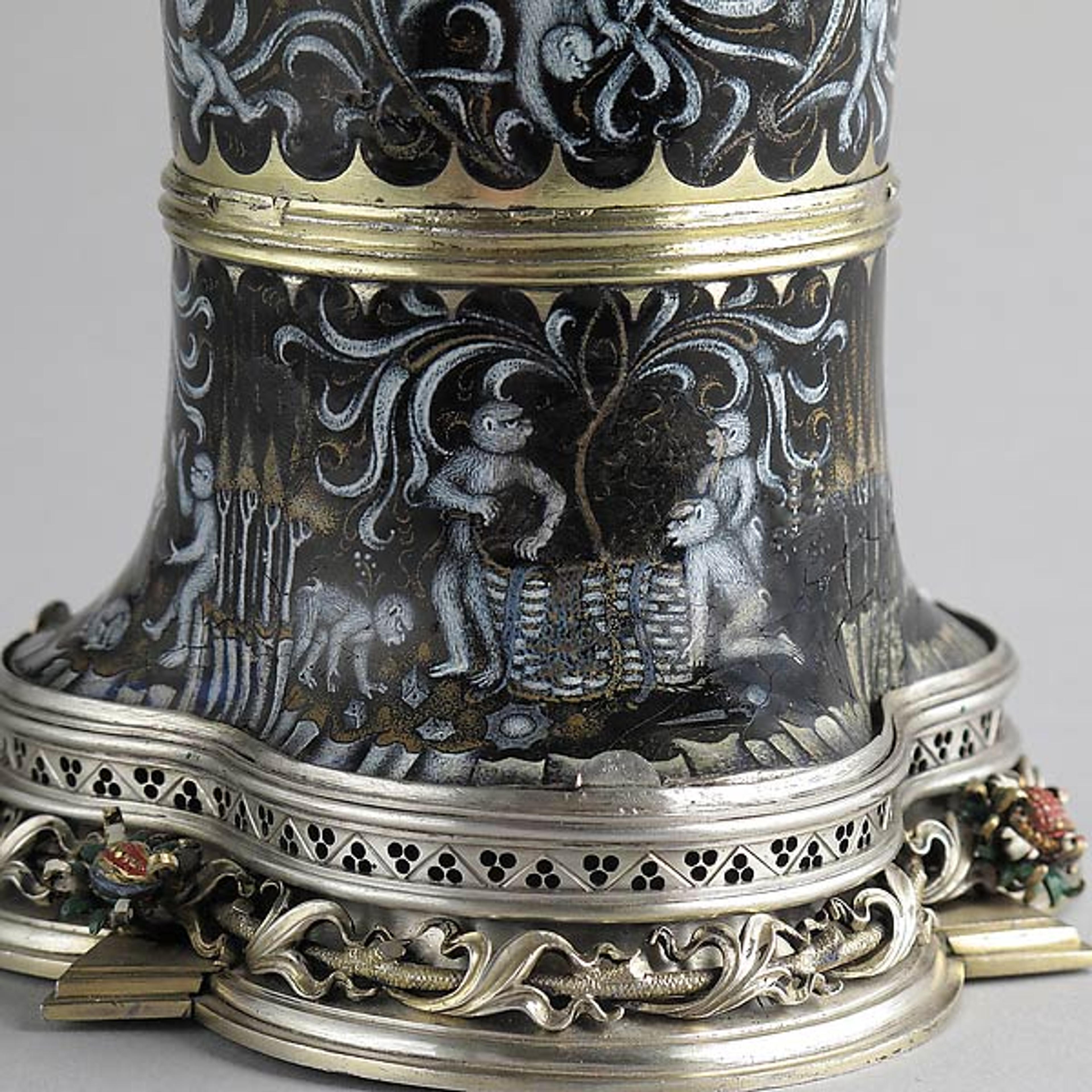 Beaker ("Monkey Cup"), ca. 1425–50. Probably made in the Burgundian territories. Silver, silver gilt, and painted enamel; Overall 7 7/8 x 4 5/8 in. (20 x 11.7 cm). The Metropolitan Museum of Art, The Cloisters Collection, 1952 (52.50)