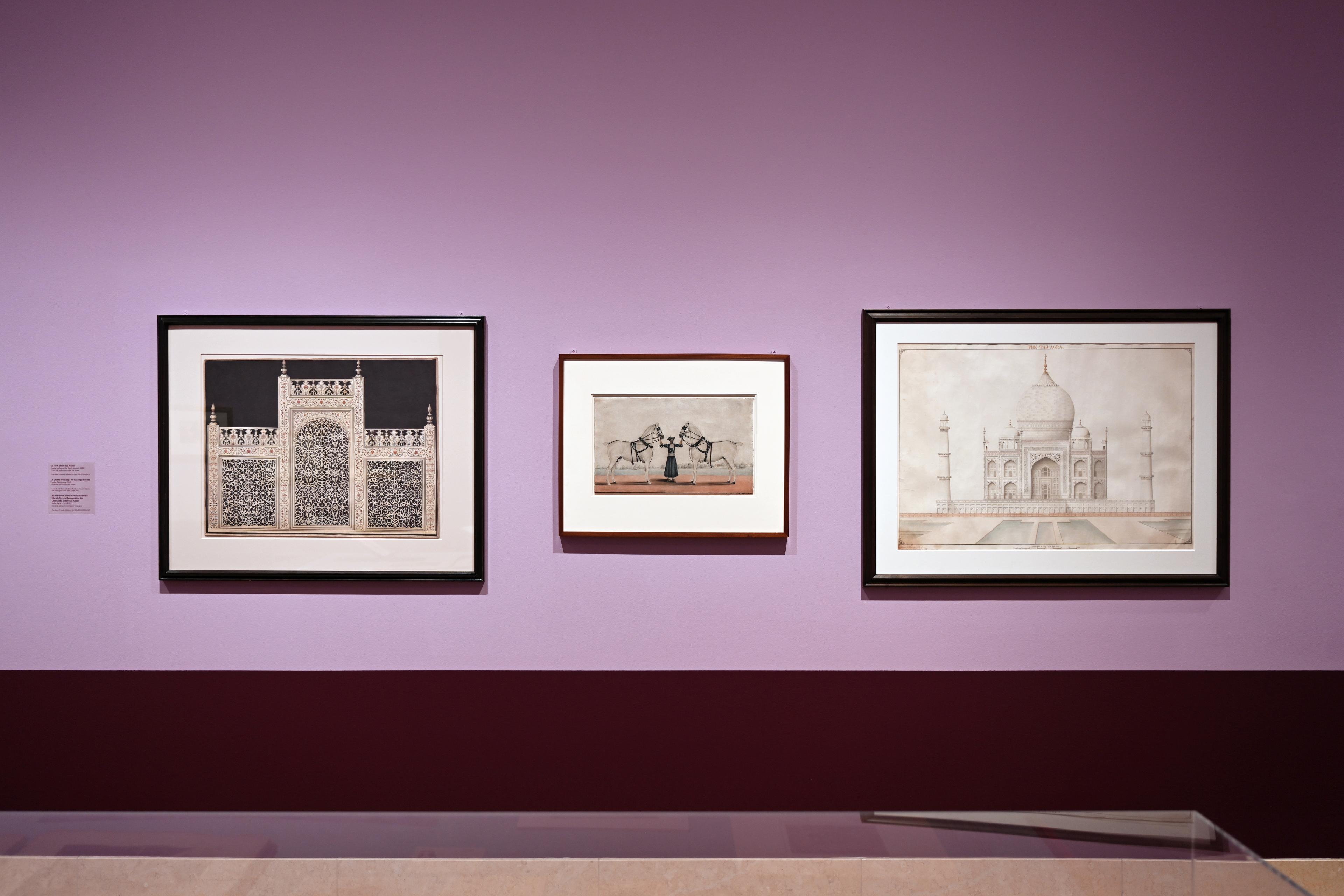 An art gallery room with purple walls displays framed historical paintings. The pieces are varied in size, and a glass display case is partially visible.