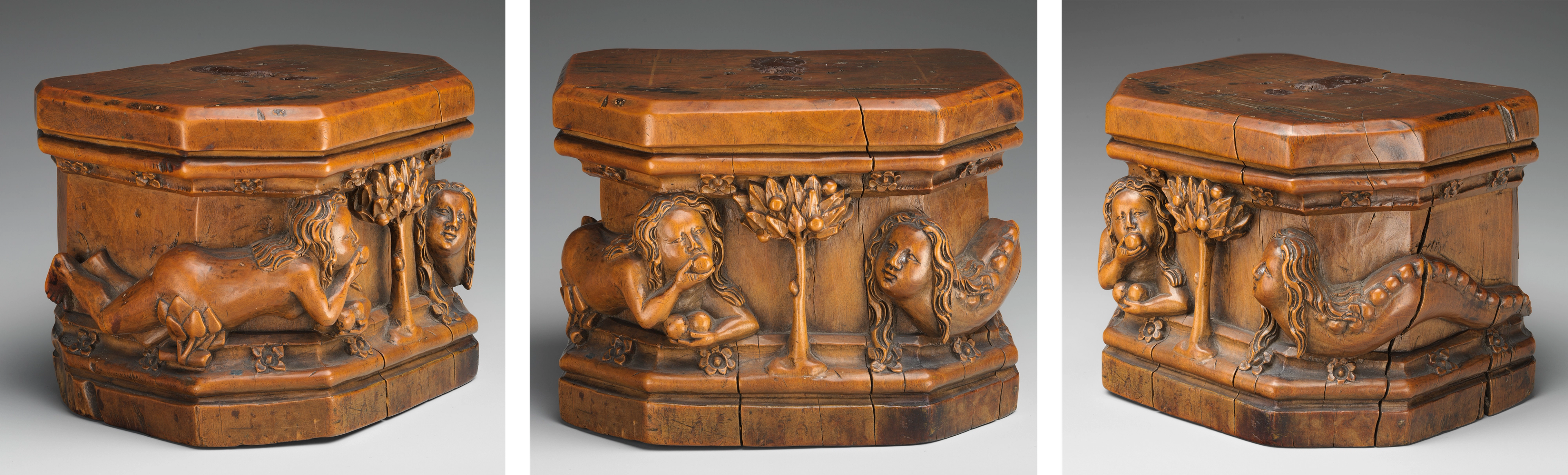 Three views of a carved wooden base showing a woman and serpentine figure on either side of a fruit tree.