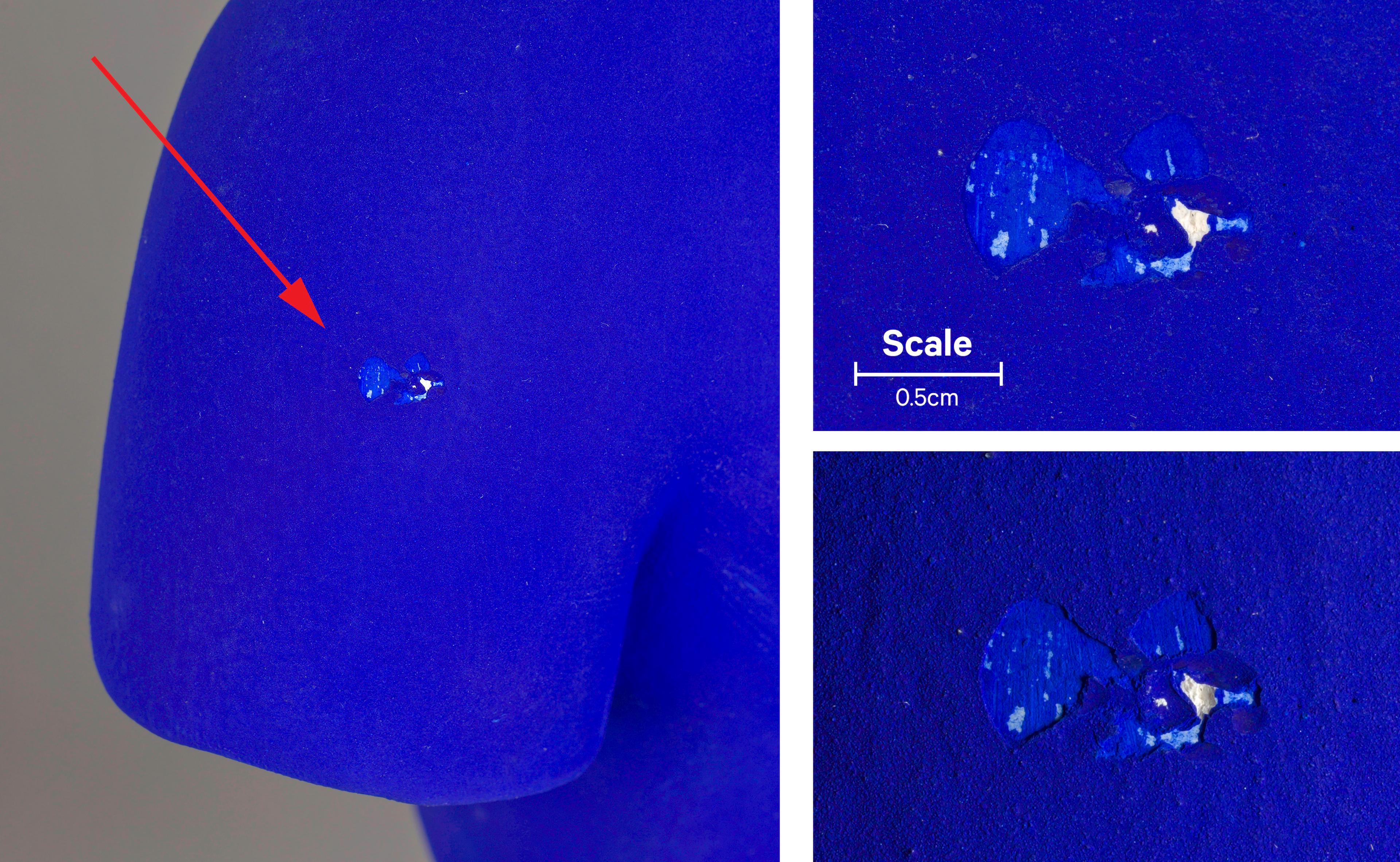 Detail image of the Venus left shoulder showing paint chipping and material loss.
