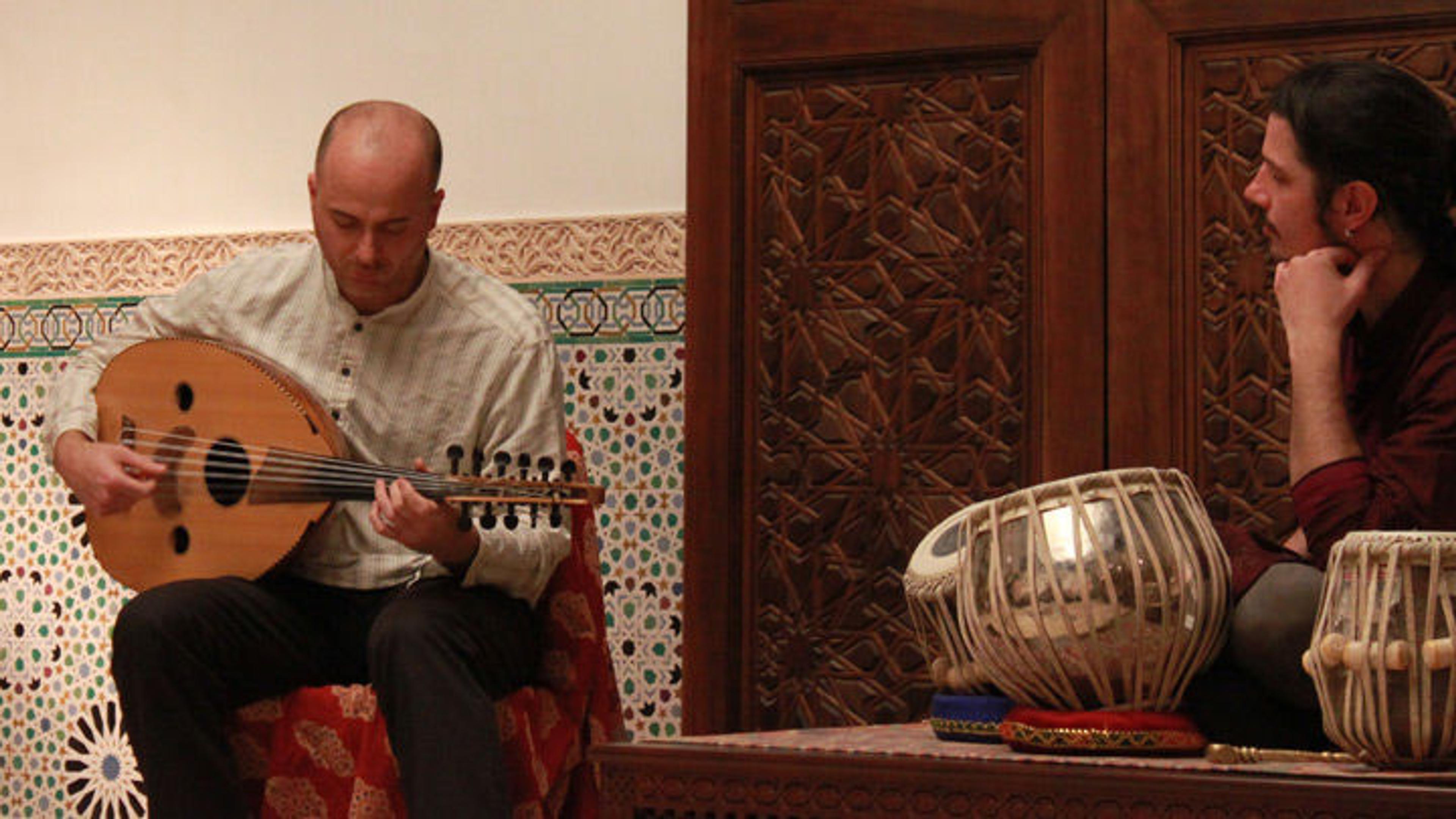Two musicians perform in The Met's Moroccan Court