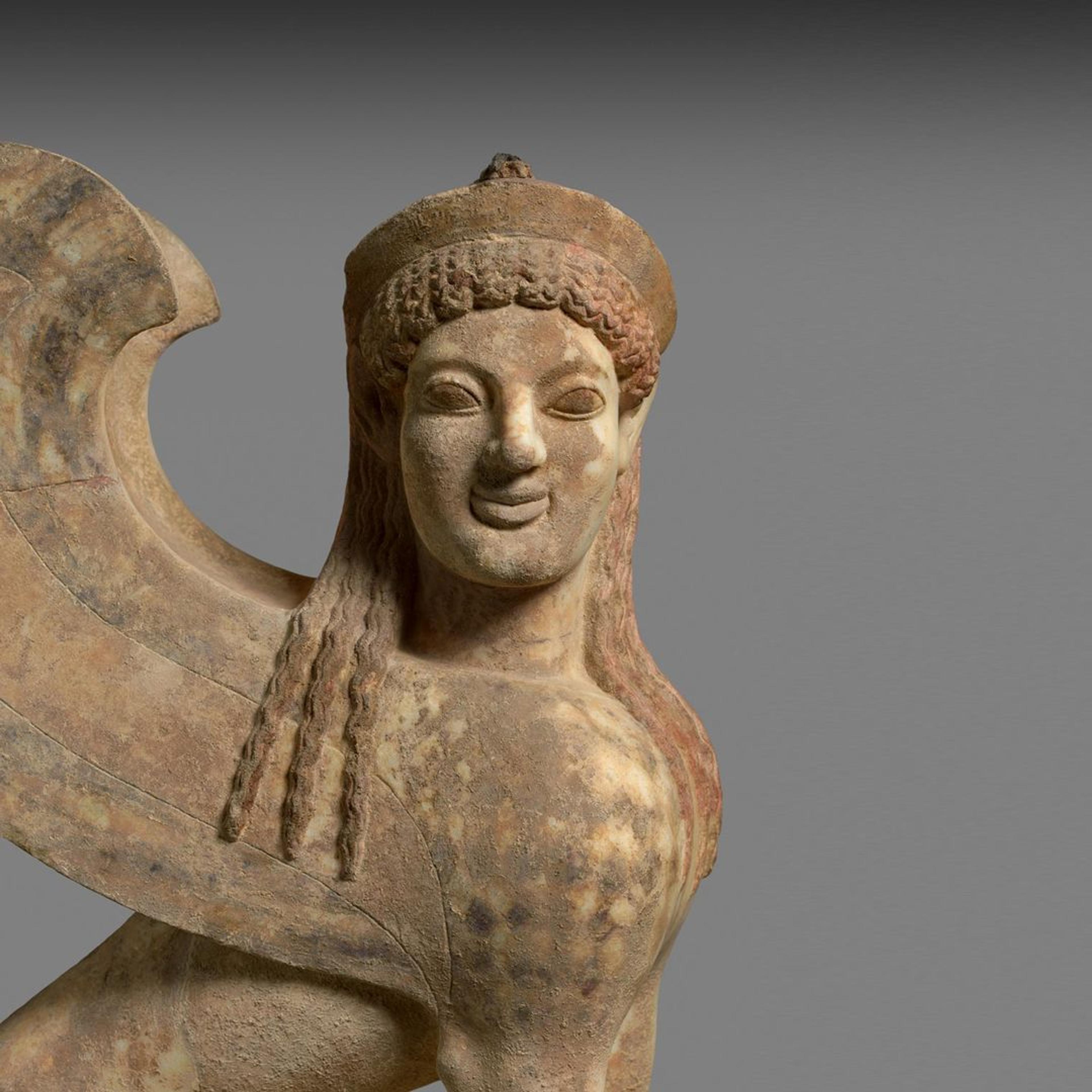 An earth toned Sphinx with wings