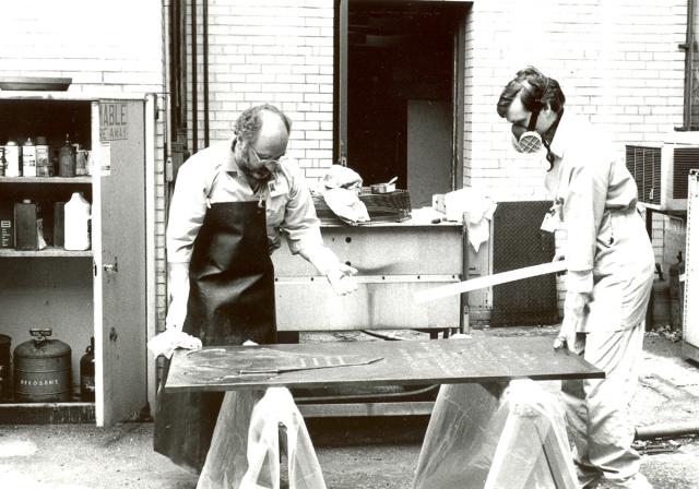 Robert Carroll and Joshua Lee cleaning, 1996