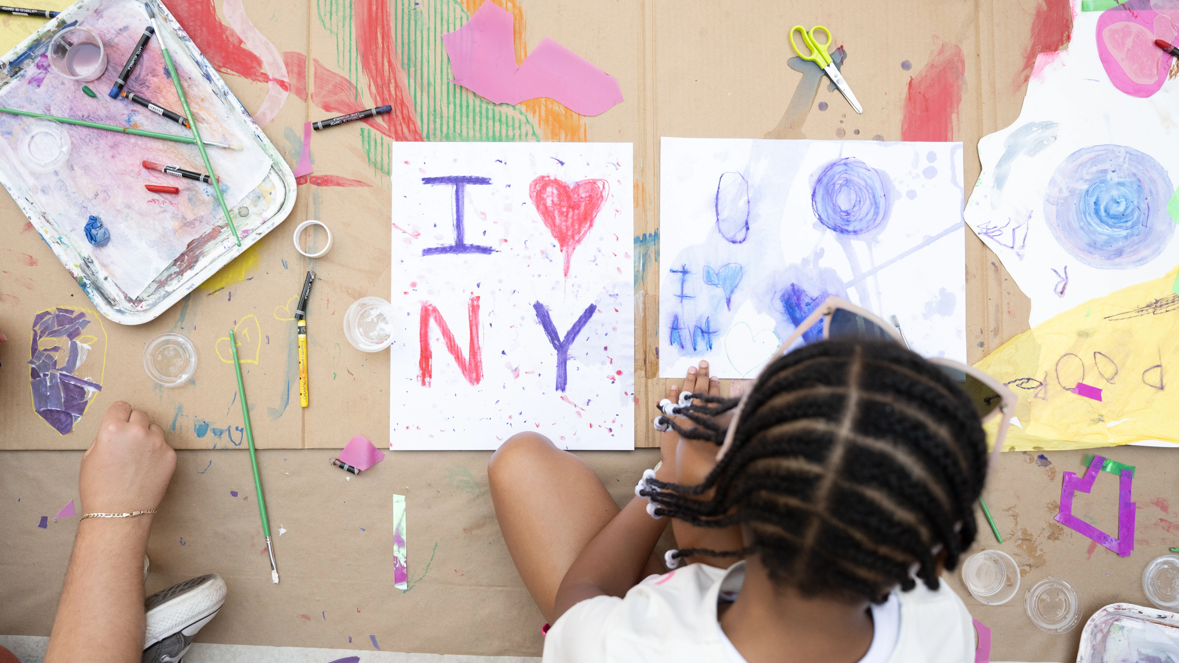 A child making art.