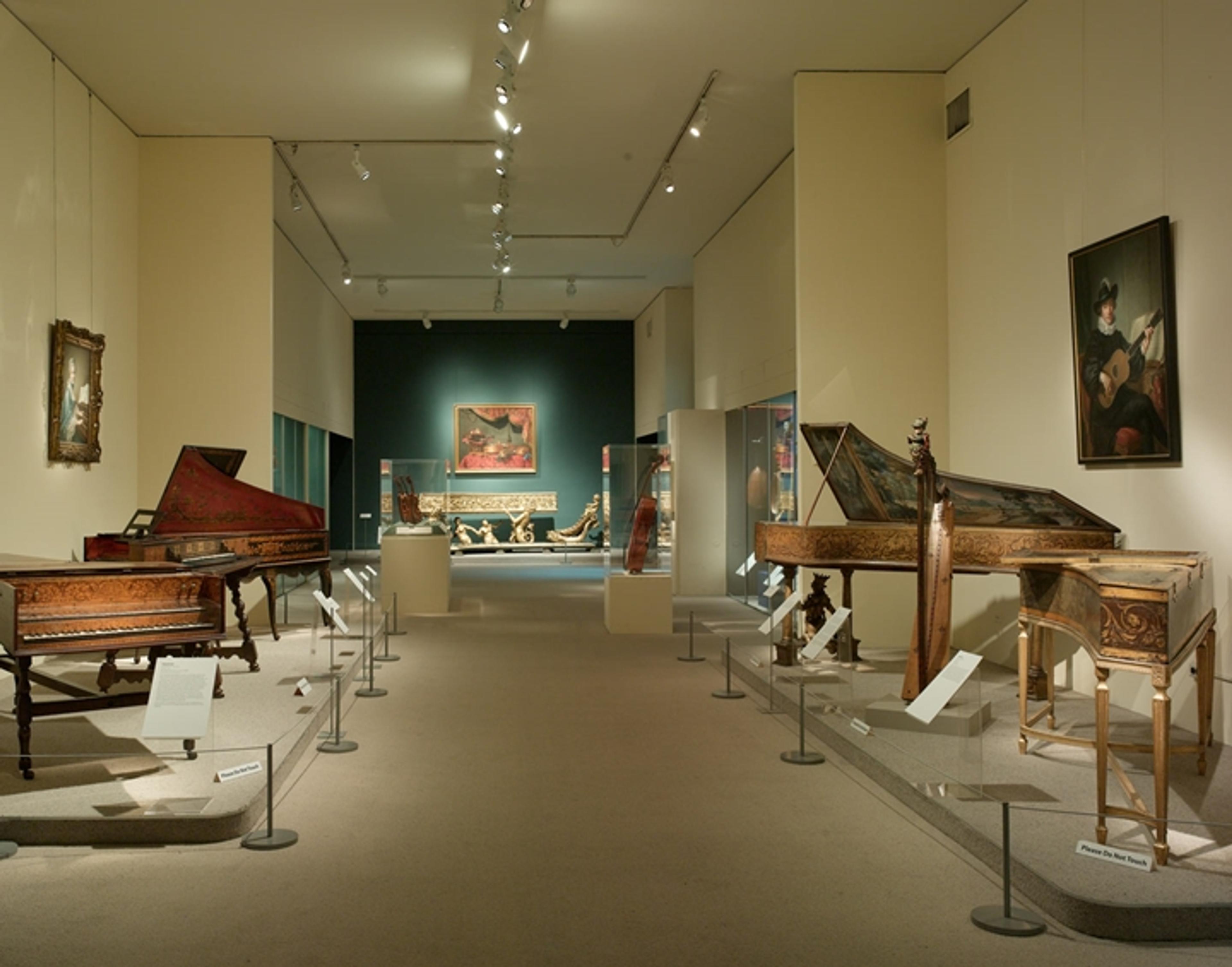 One of the former Musical Instruments galleries, showcasing a selection of The Met's historic pianos