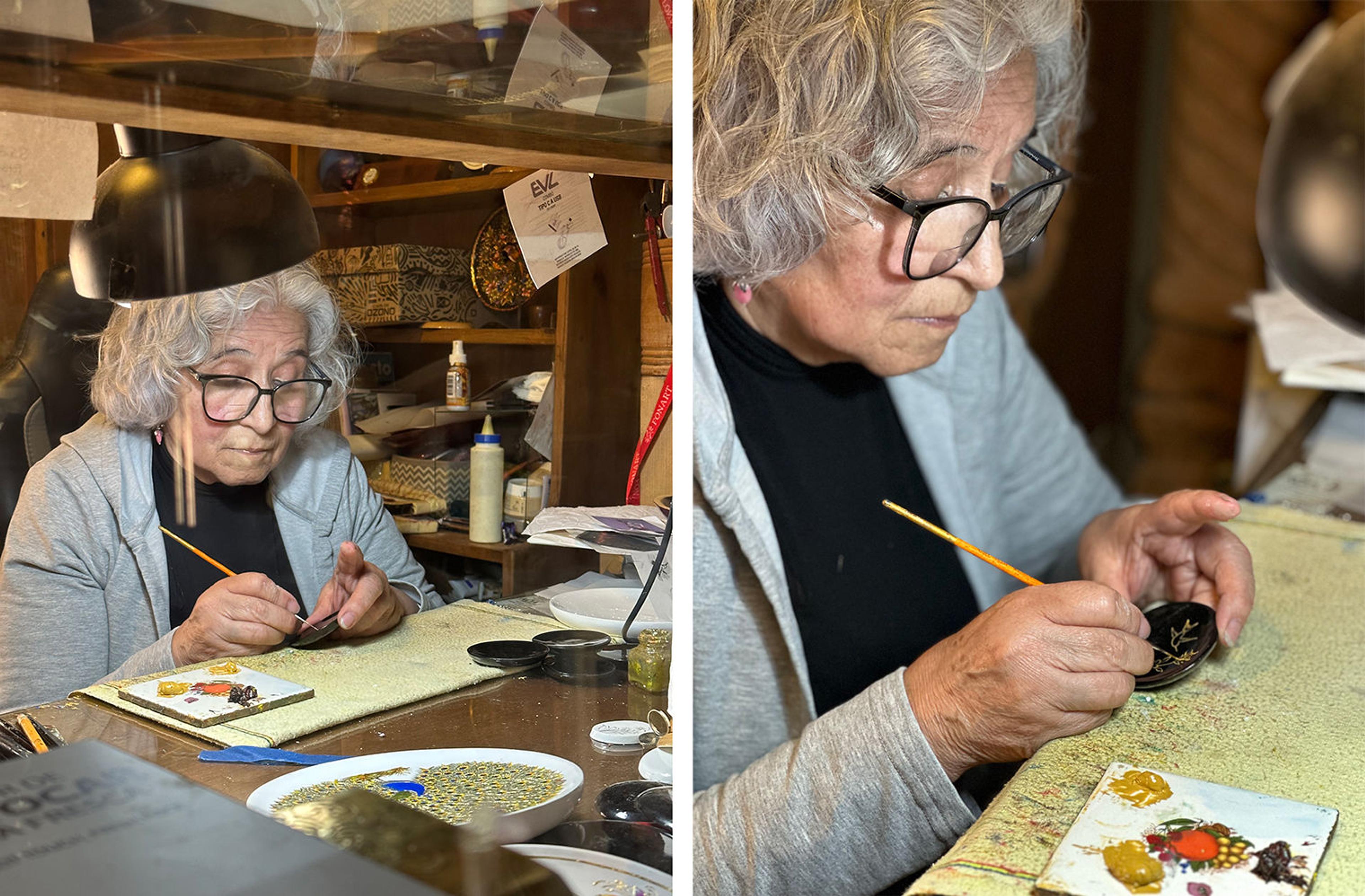 Two images of a person painting details on a small black plate.