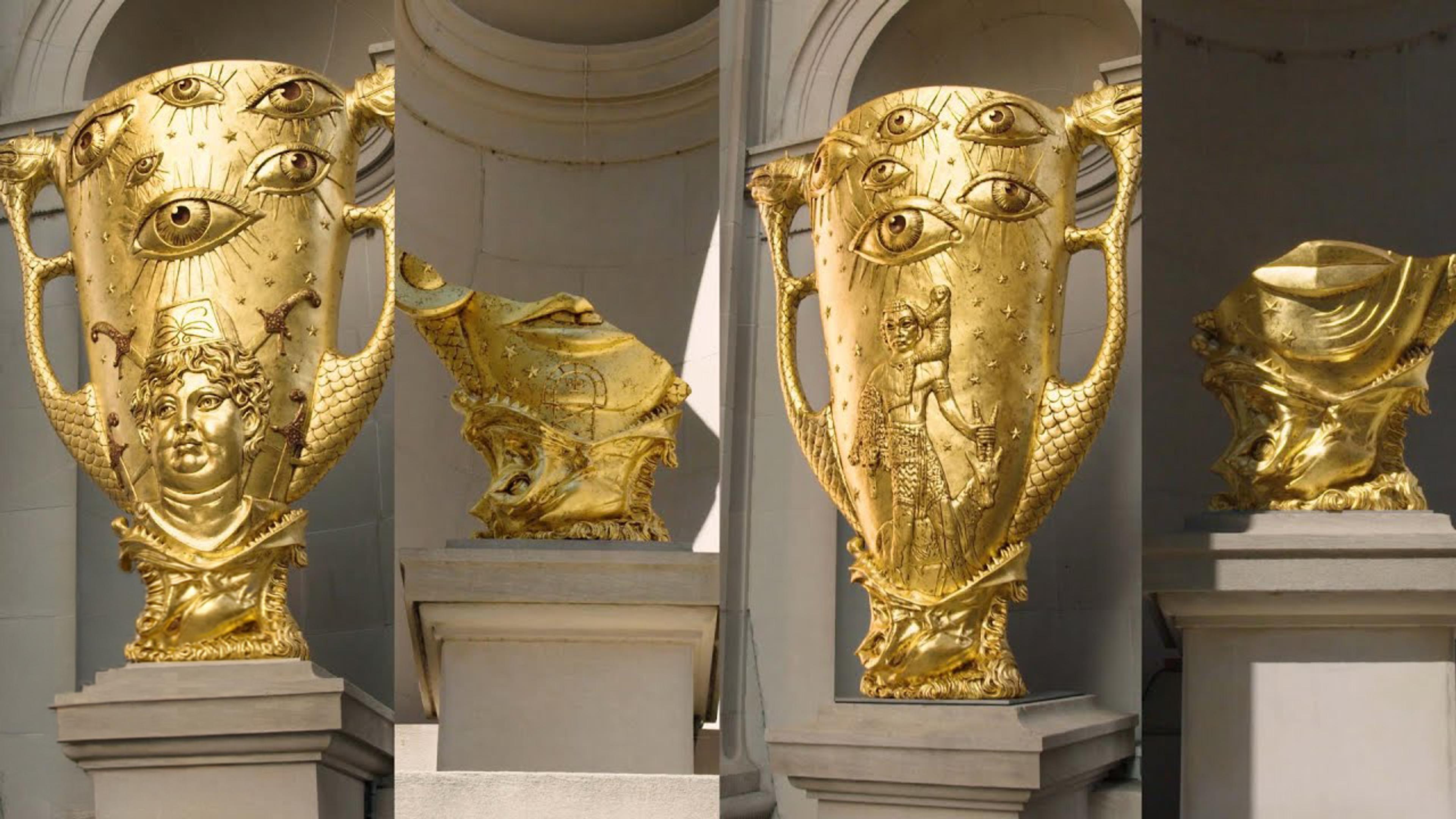 Four gilded sculptures by Hew Locke as installed in The Met's facade.