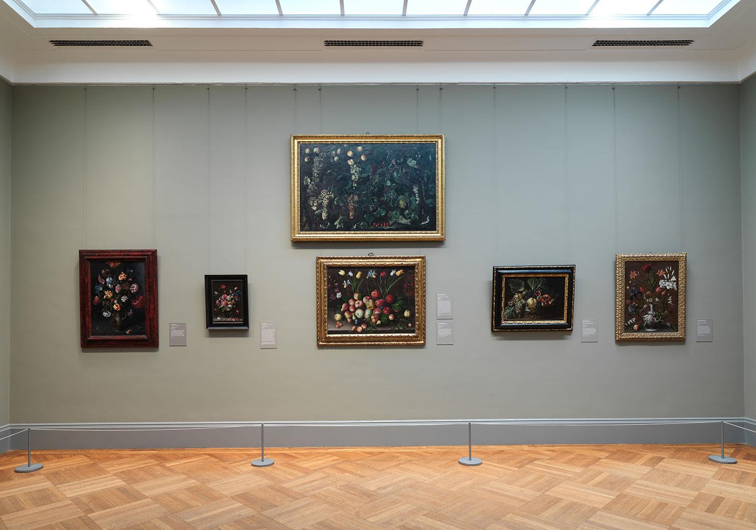 Image of six still life paintings in The Met's European Paintings galleries depicting flowers and fruit.