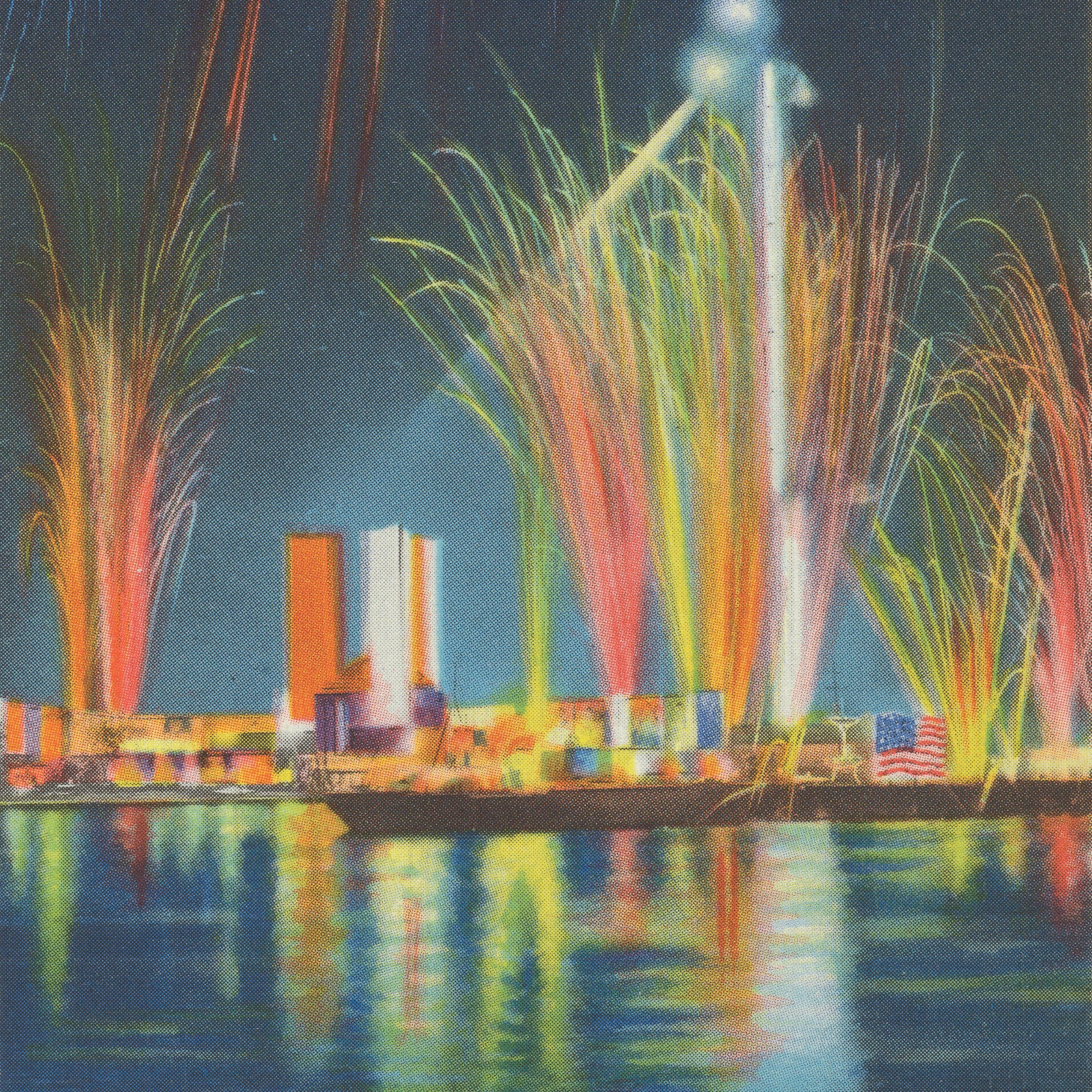 A colorful fireworks display on a river