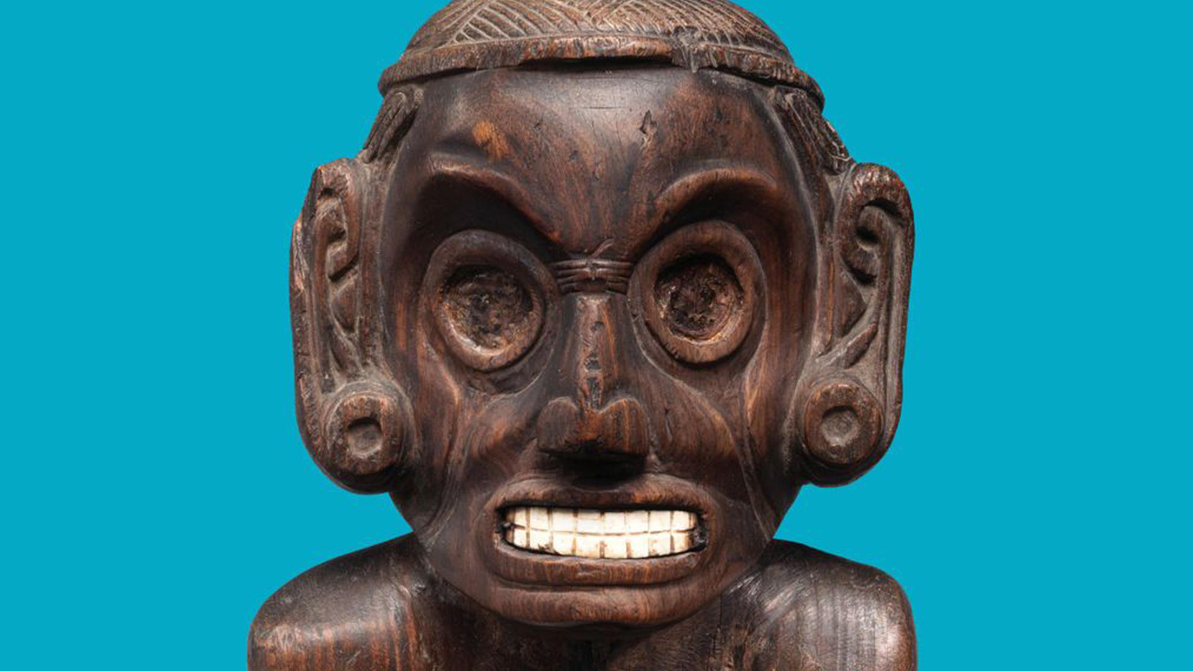 Color image of a wooden anthropomorphic deity figure (zemí) made in the Dominican Republic ca. AD 1000