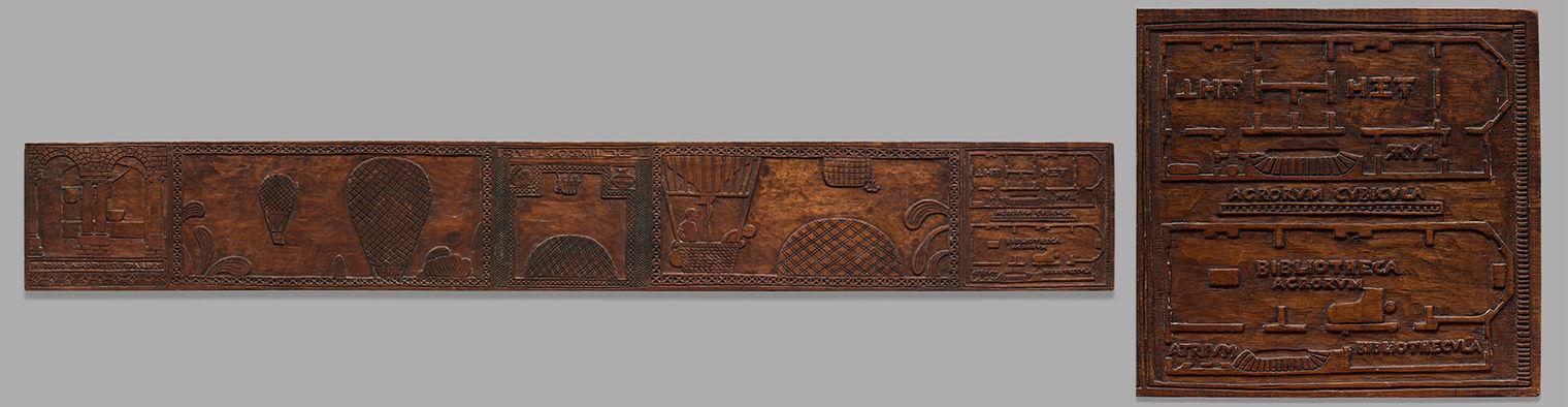 Dark brown-red wood panel carving of an apartment's layout via a floorplan.