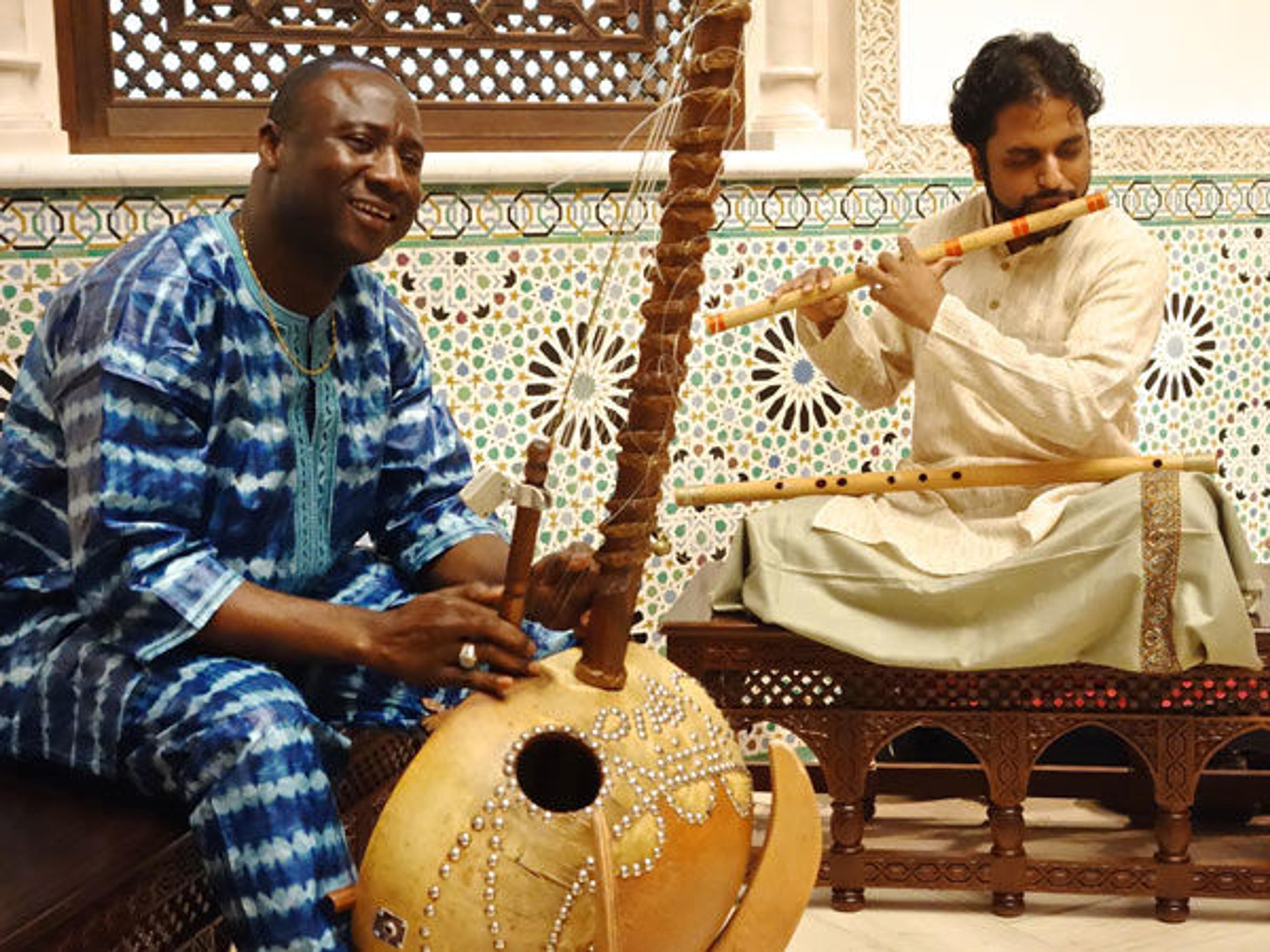 Yacouba Sissoko (left) and Jay Gandhi (right) perform in the Moroccan Court. Photo courtesy of Catherine Katona