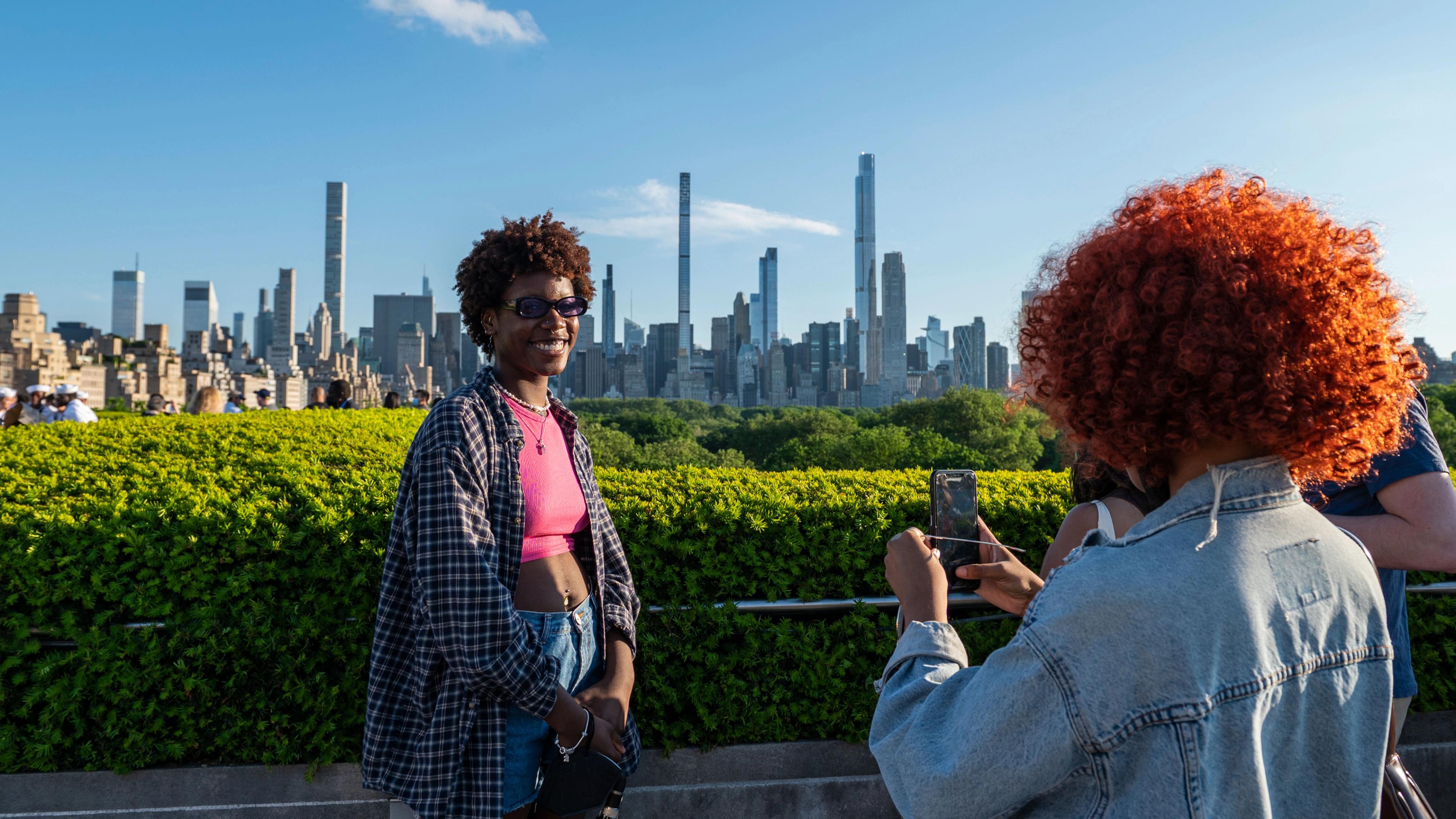 A group of people on The Met's Cantor Roof Garden