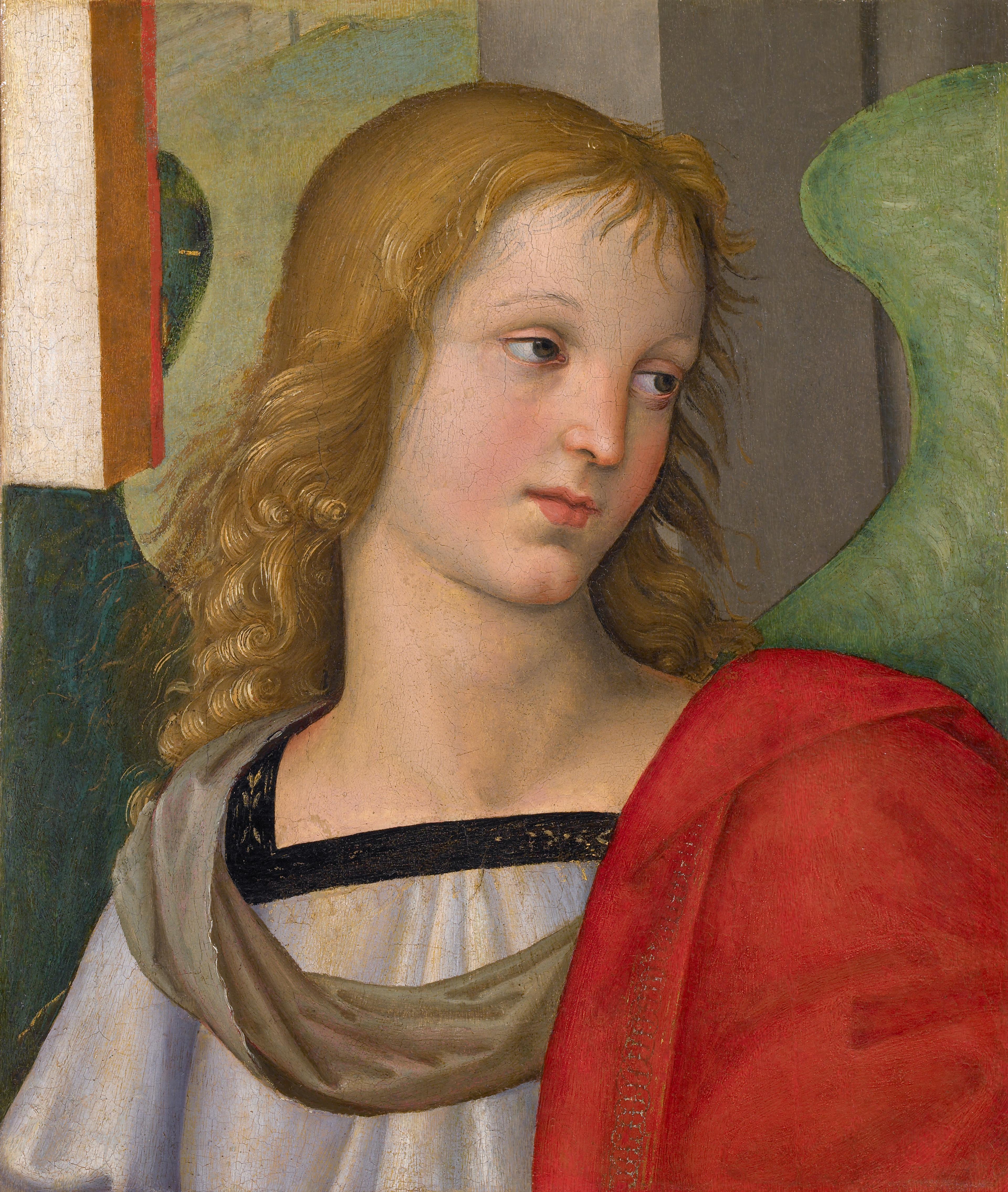 A blonde, angel looking downwards with a green wing coming out of its back. The angel is draped in a white and red robe.