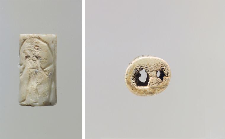 A white cylinder seal made from shell.