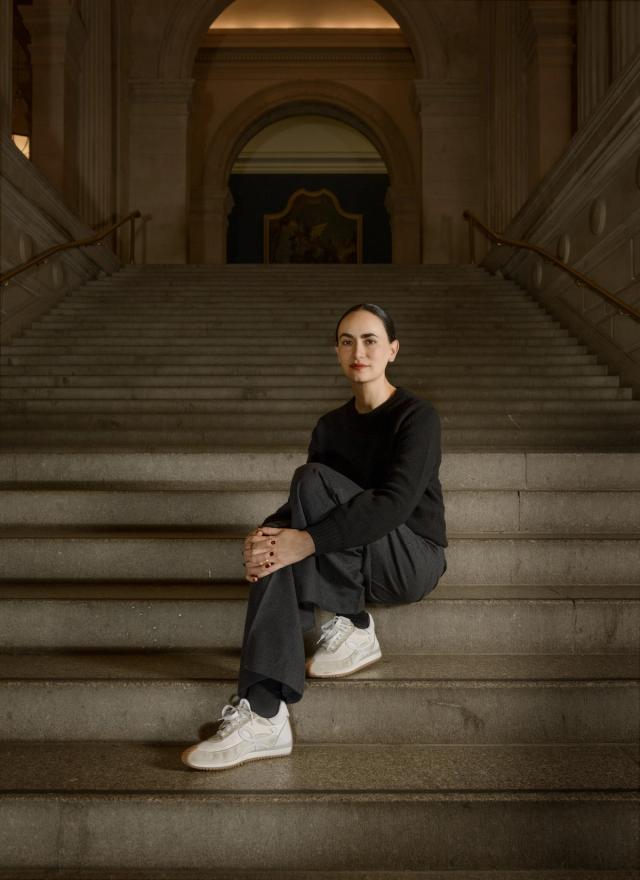 The architect Frida Escobedo posing on The Met's Grand Staircase.