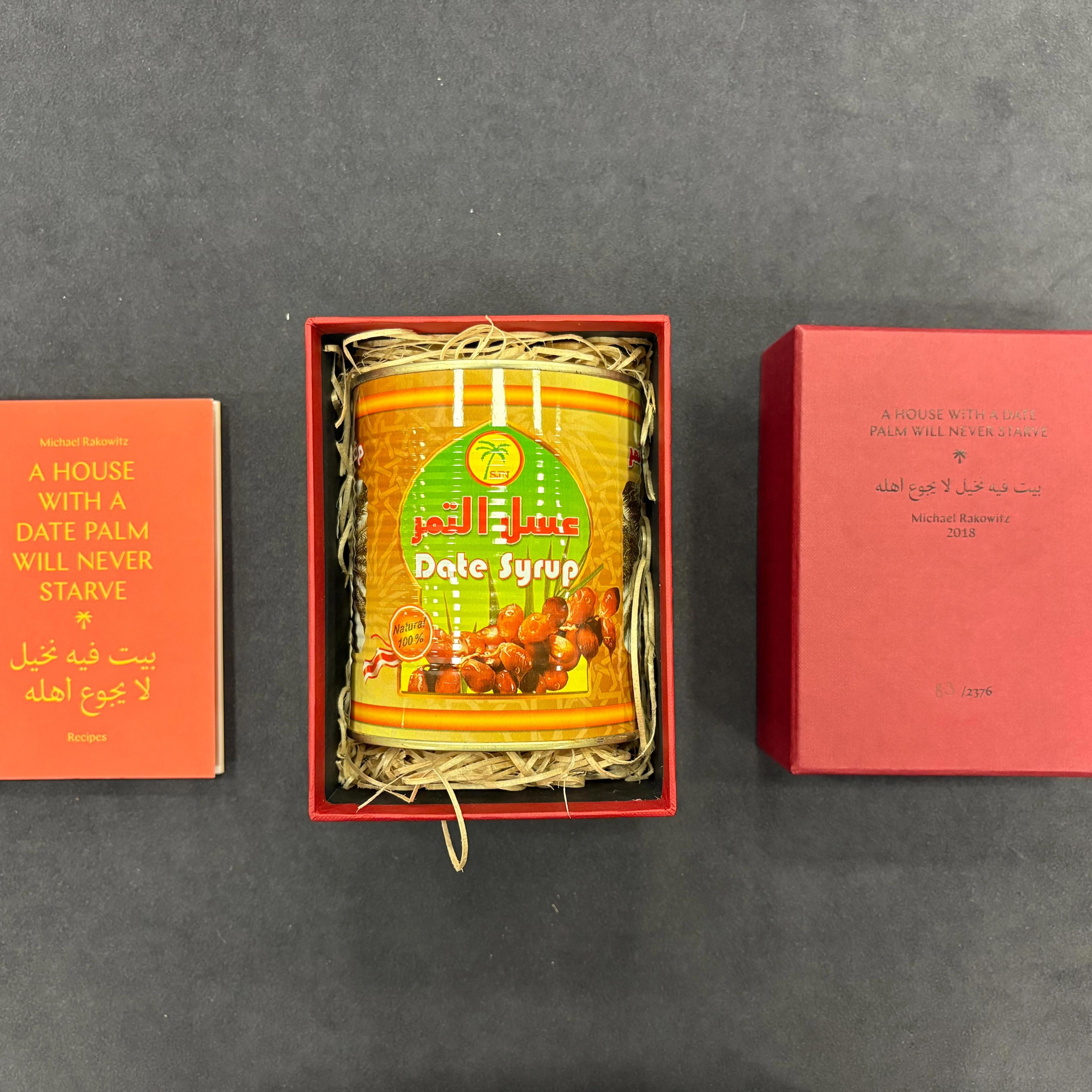 Can of date syrup in a box