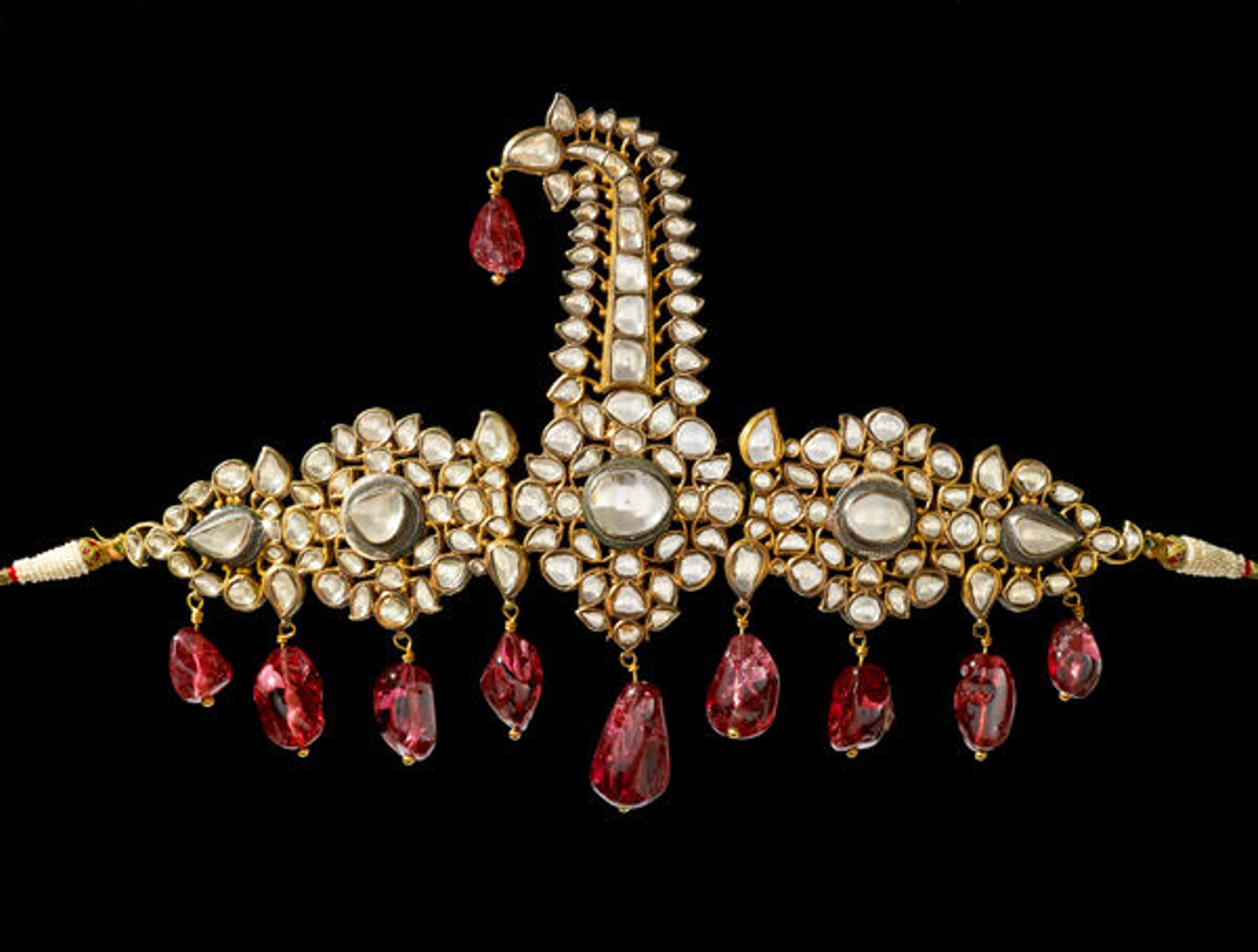 Turban ornament (sarpesh), 1800–50. South India, Hyderabad. Gold set with diamonds, with hanging spinels of earlier date; enamel on reverse. The Al-Thani Collection. © Servette Overseas Limited 2013. All rights reserved.