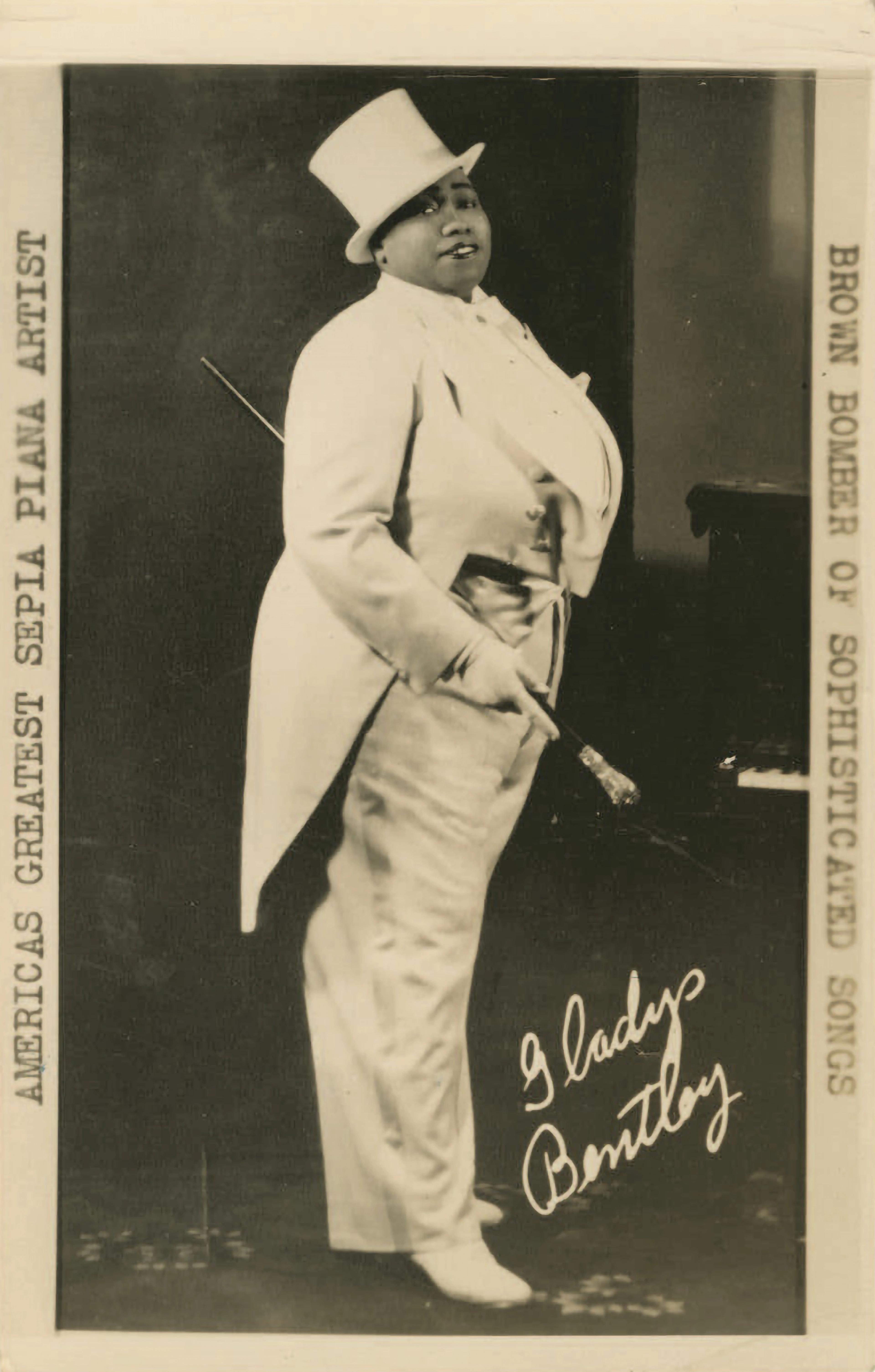 Gladys Bentley posed assertively in a white tuxedo and white top hat