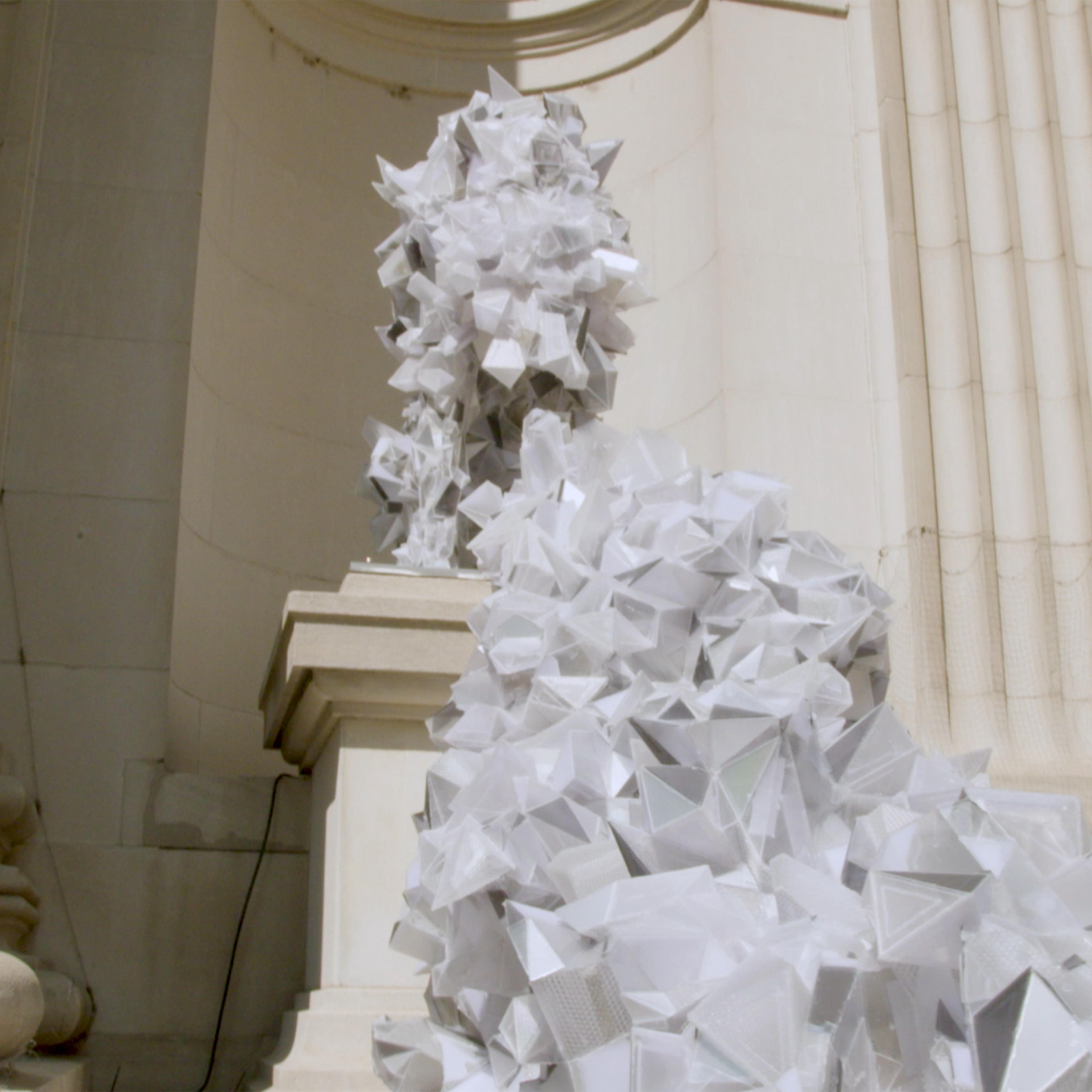 White shiny metal armor sculpture