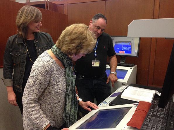 Ron and Lisa helping scan