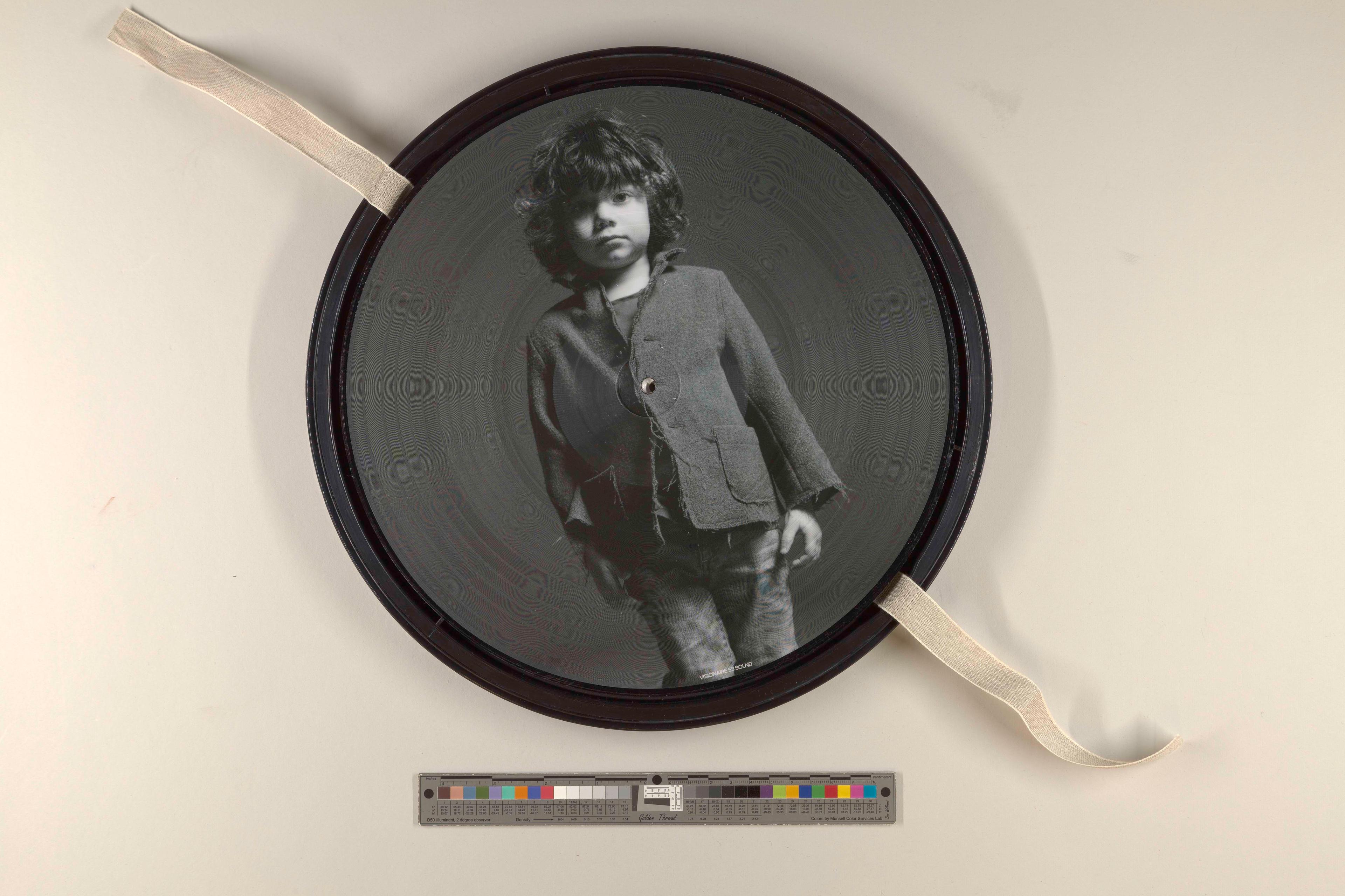Record with a black and white portrait of a child