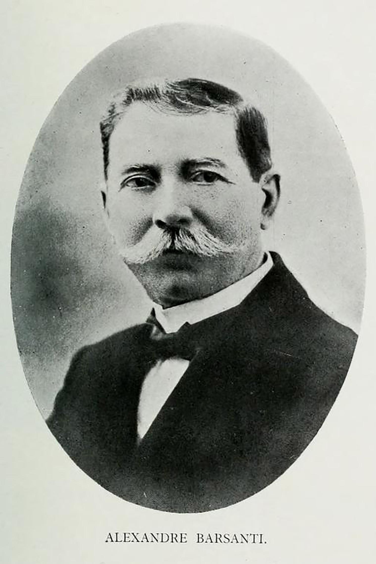 Black and white photograph of a man with a mustache