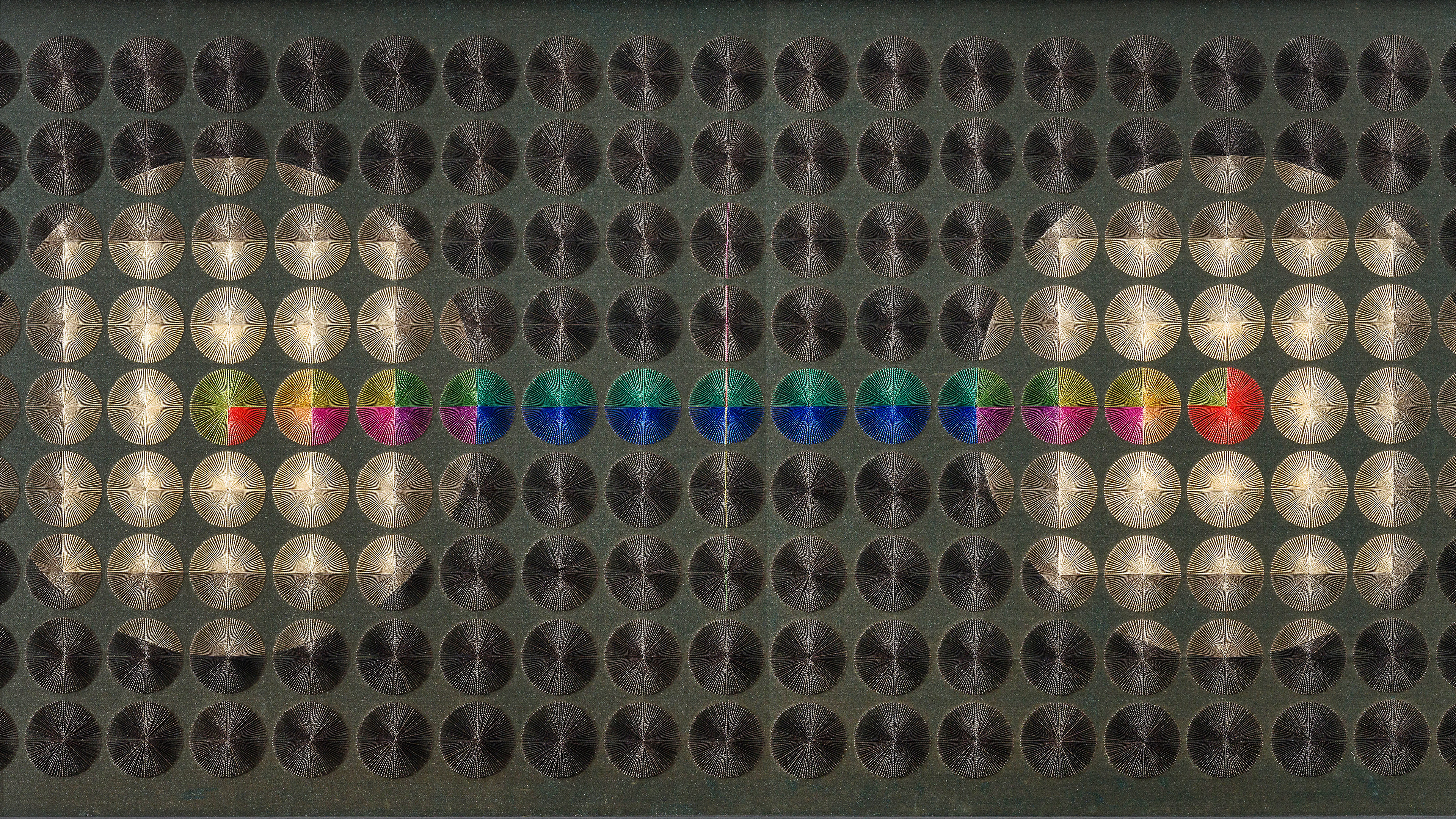 Grey square with ovals within larger ovals.