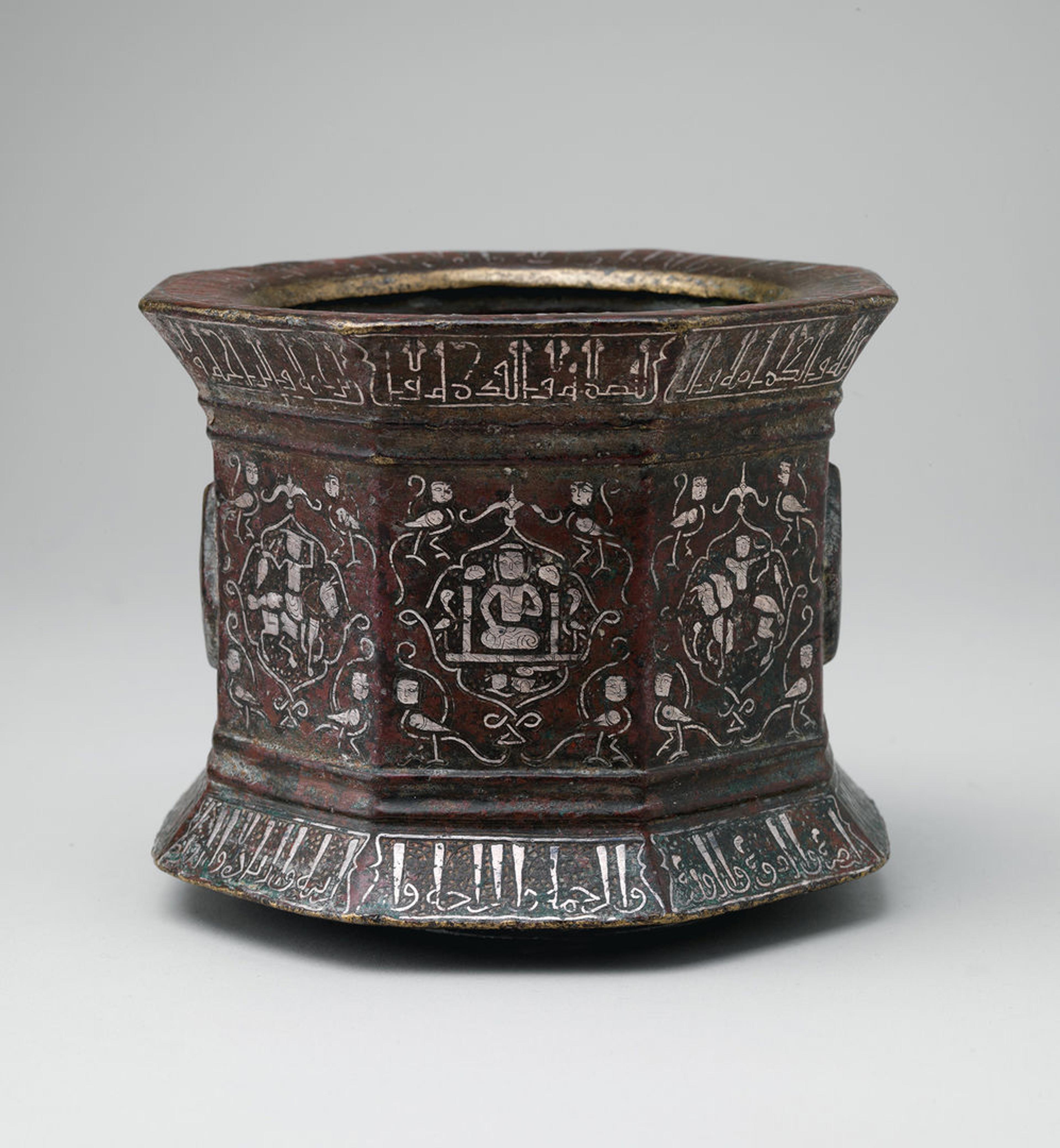 Bronze mortar with engraved details