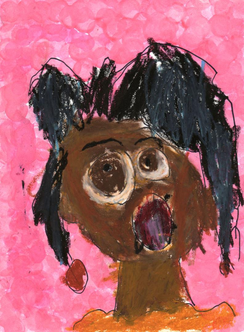 Portrait of a young girl with a surprised expression.