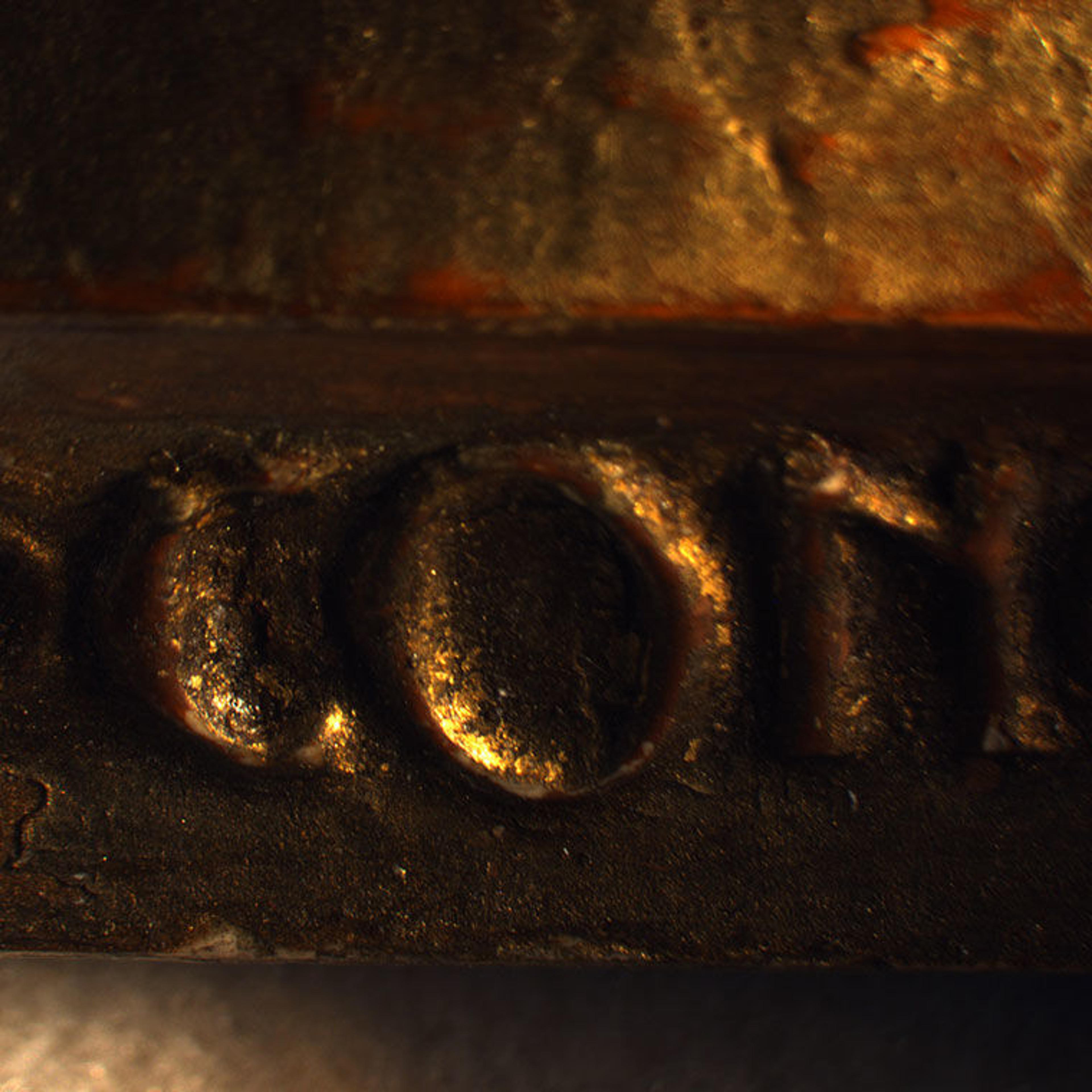 Detail view of one section of the frame for Jan van Eyck's "The Last Judgment"