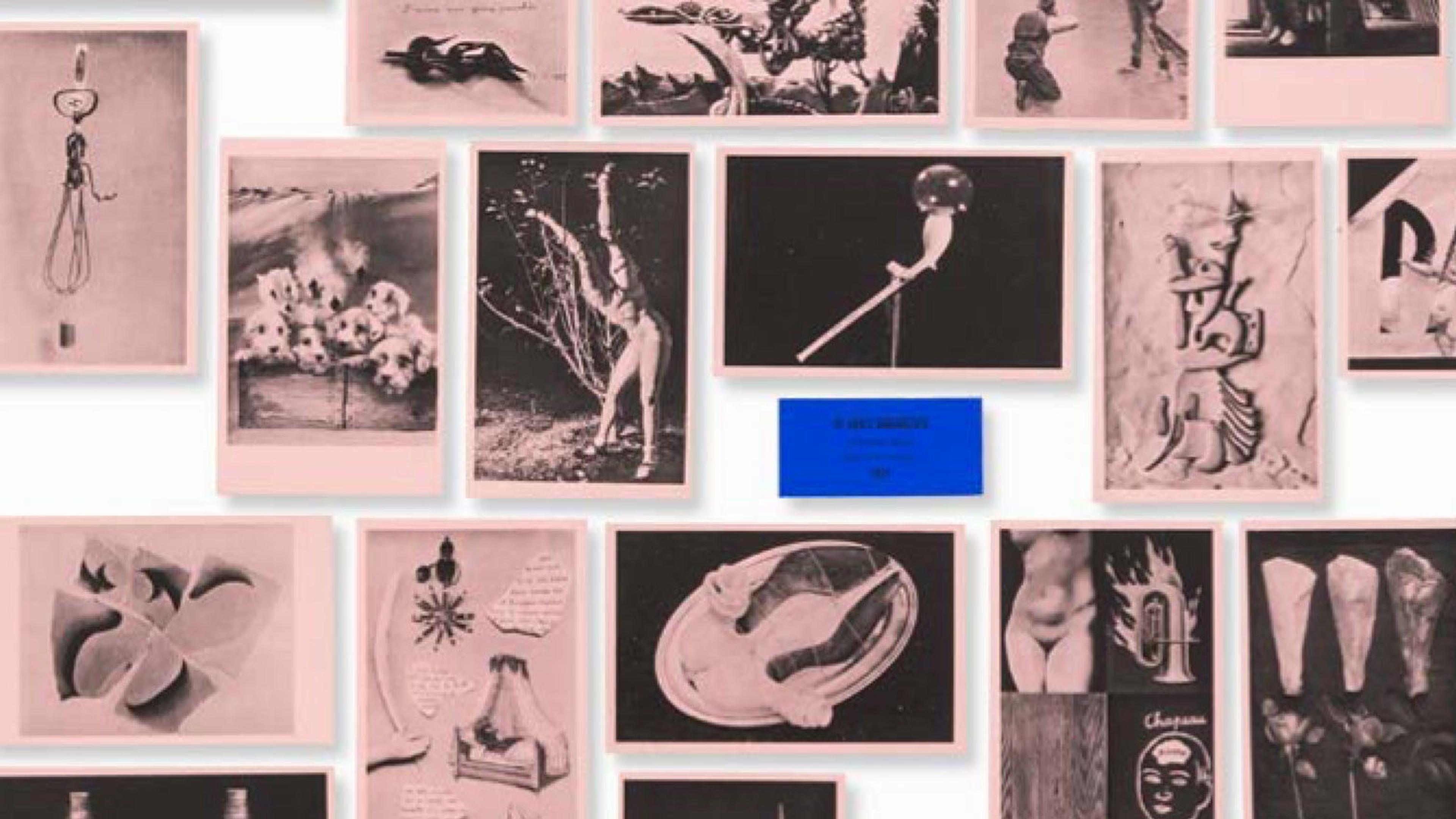 A set of postcards printed on pink woven paper and their original blue title label