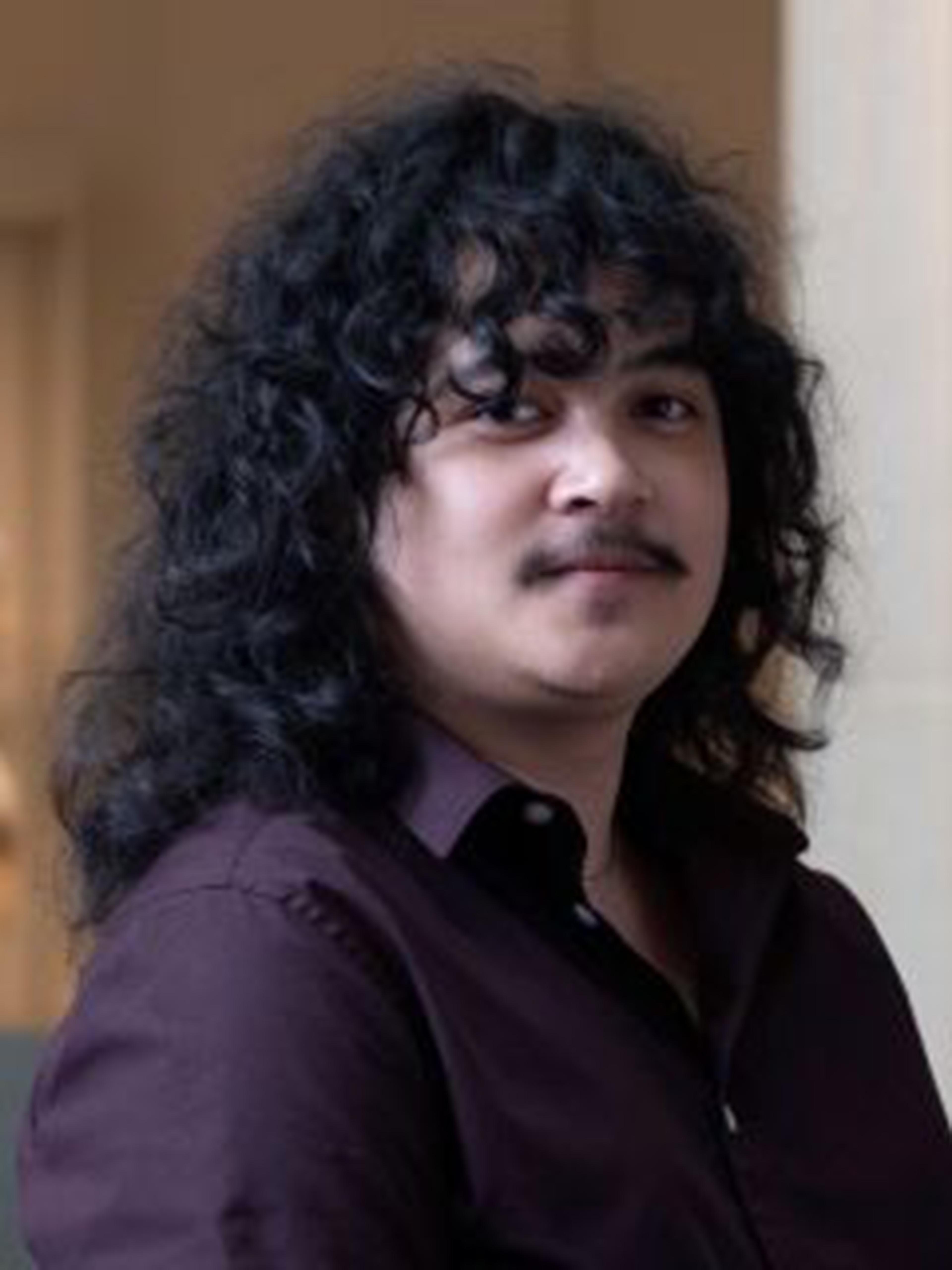Headshot of Christian Derek Aguilar