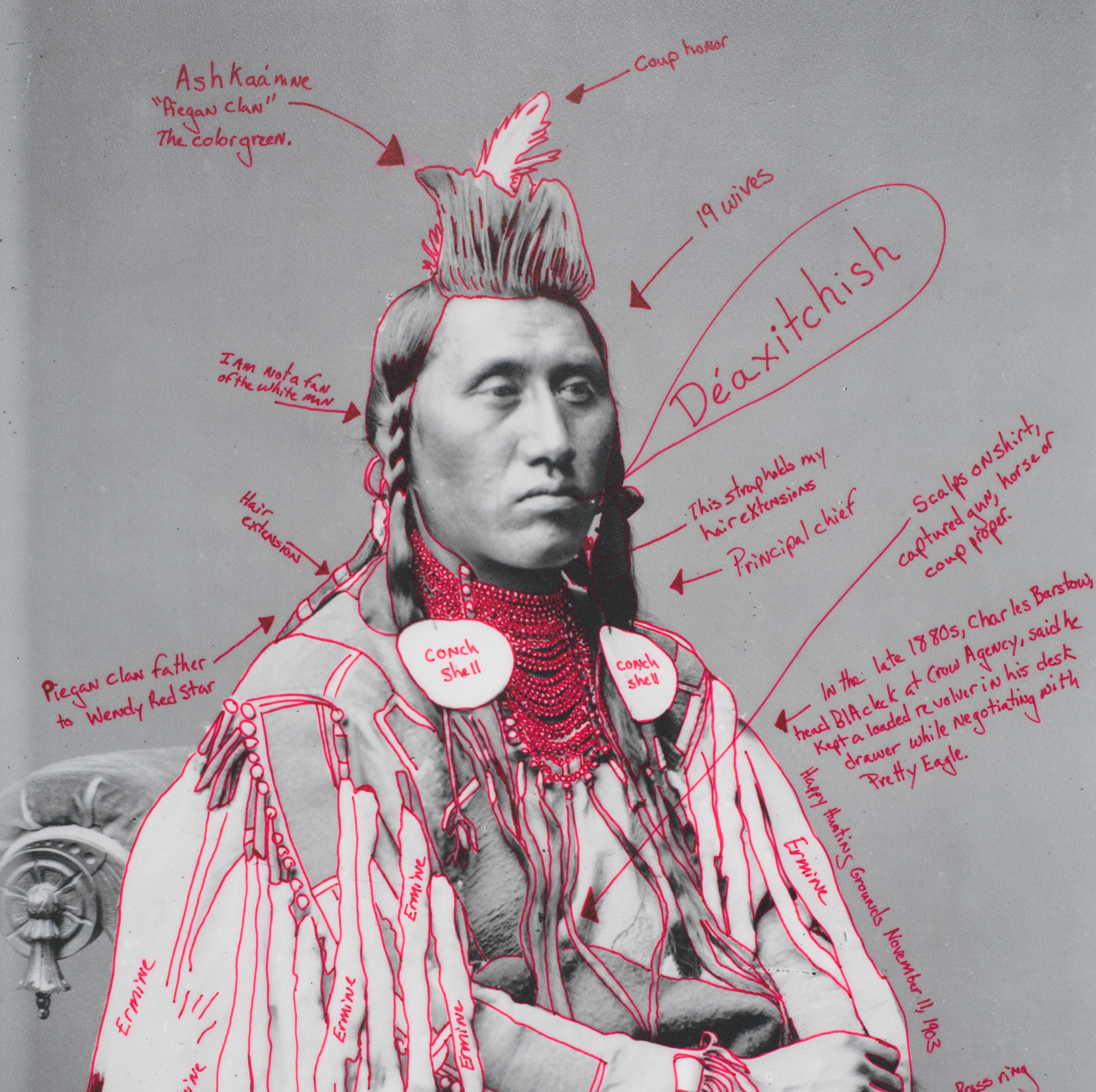 Black-and-white photo of an Indigenous man, superimposed with contemporary annotations in red marker.