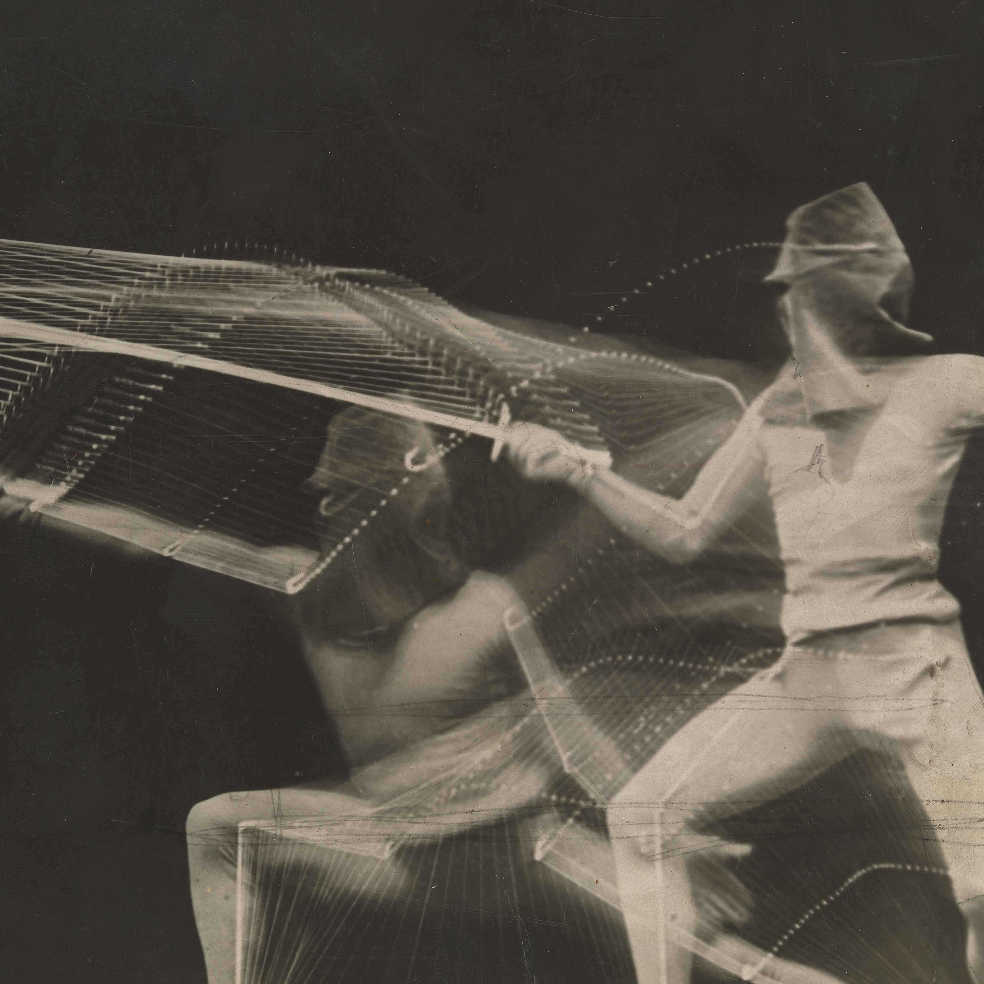 Black and white photograph of fencer lunging forward and standing back in a squat position