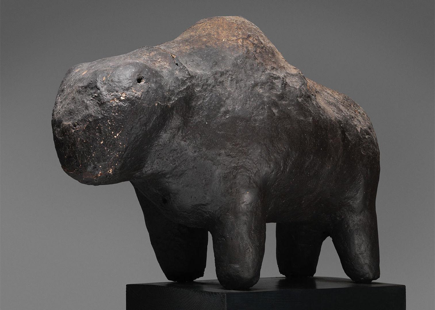 A boli carved out of stone from "Sahel: art and Empires on the Shores of the Sahara" at The Met