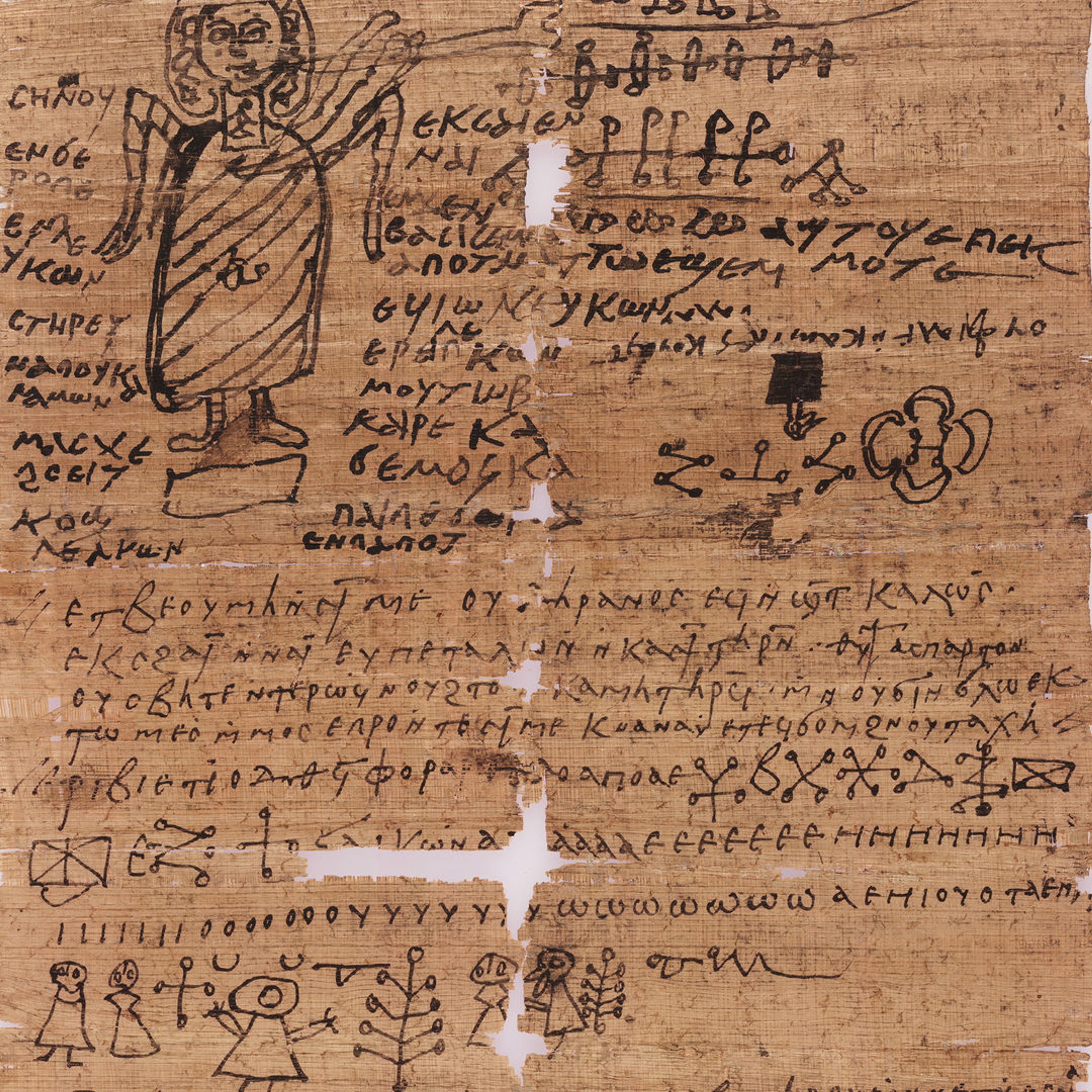 A papyrus with a hand-drawn winged figure, Greek text, and abstract symbols, showing signs of aging and wear.