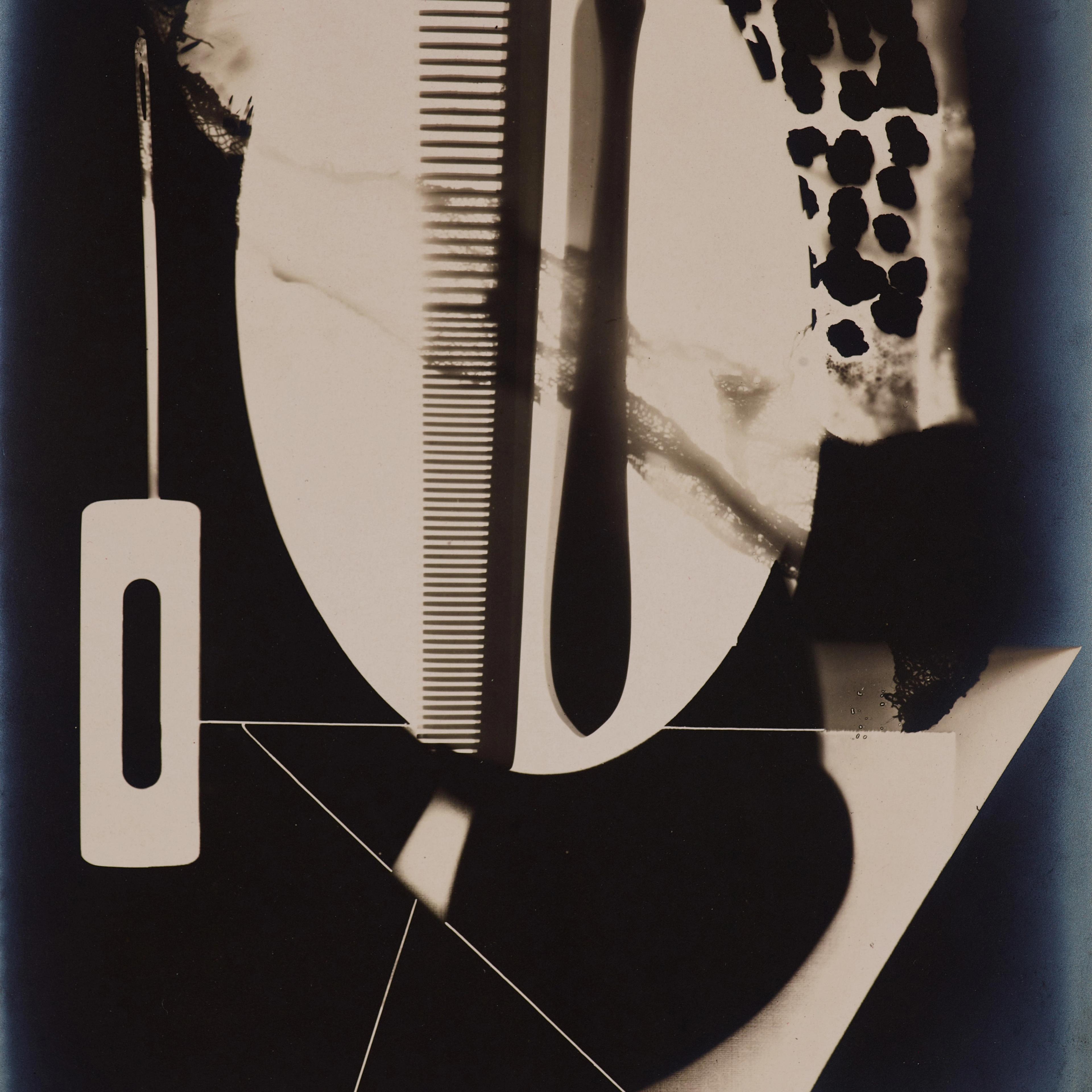 Abstract photogram with overlapping shapes, including a comb and geometric patterns, creating a surreal, monochromatic composition. Bold and mysterious.