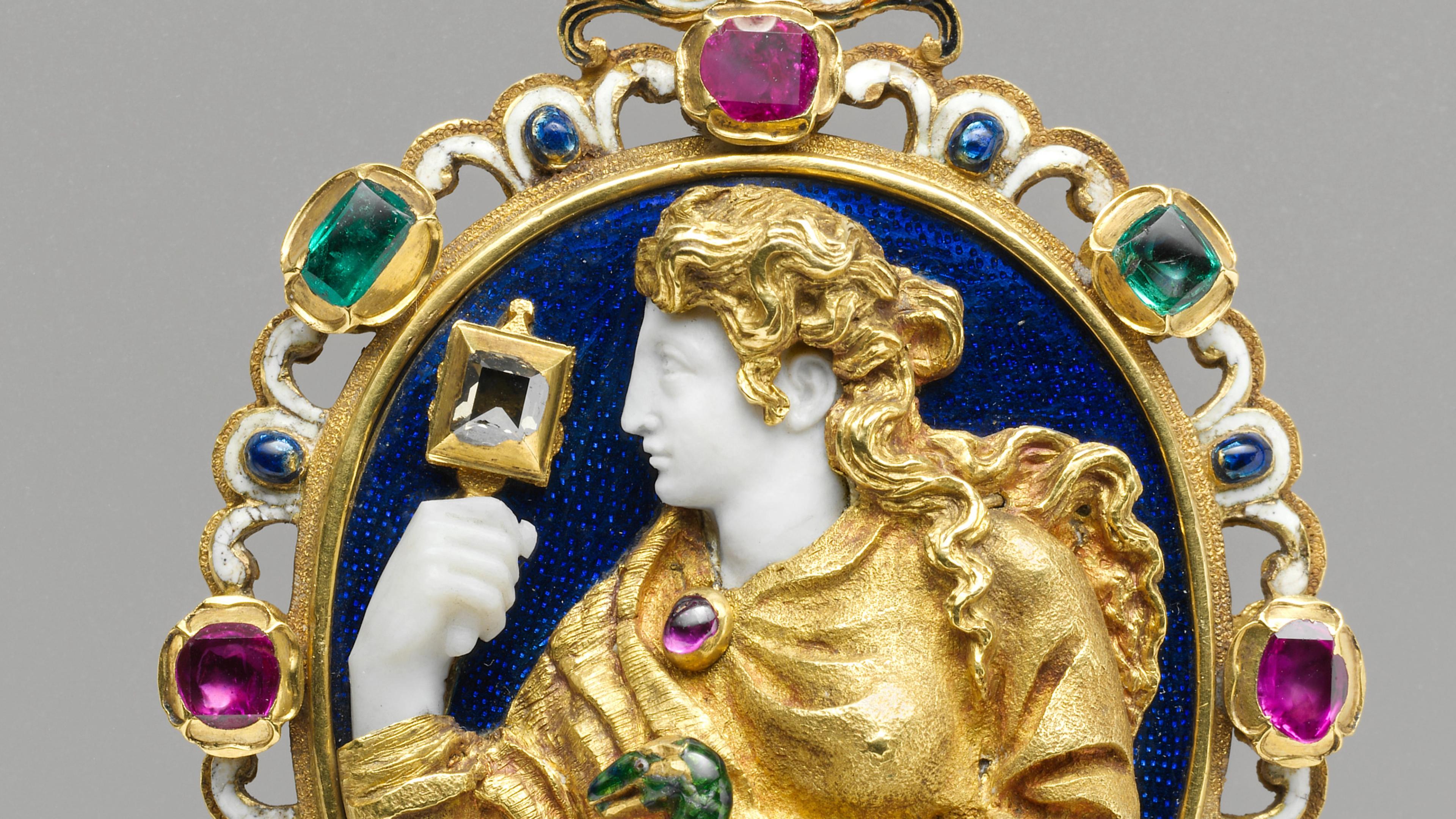 Gold pendant with figure of Prudence, accented with purple, green, and blue gemstones