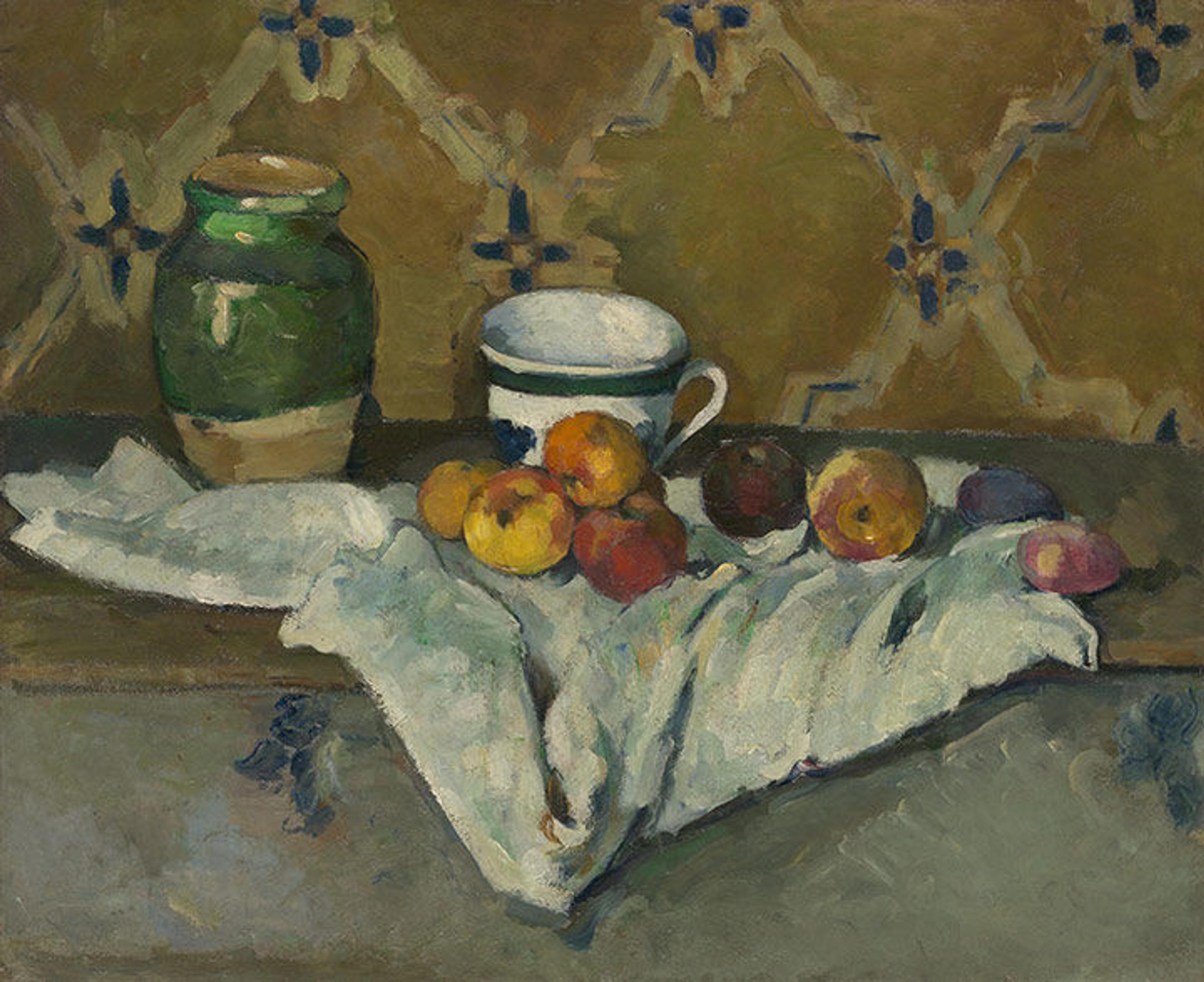 Cezanne's painting of apples, a jar and a mug. 