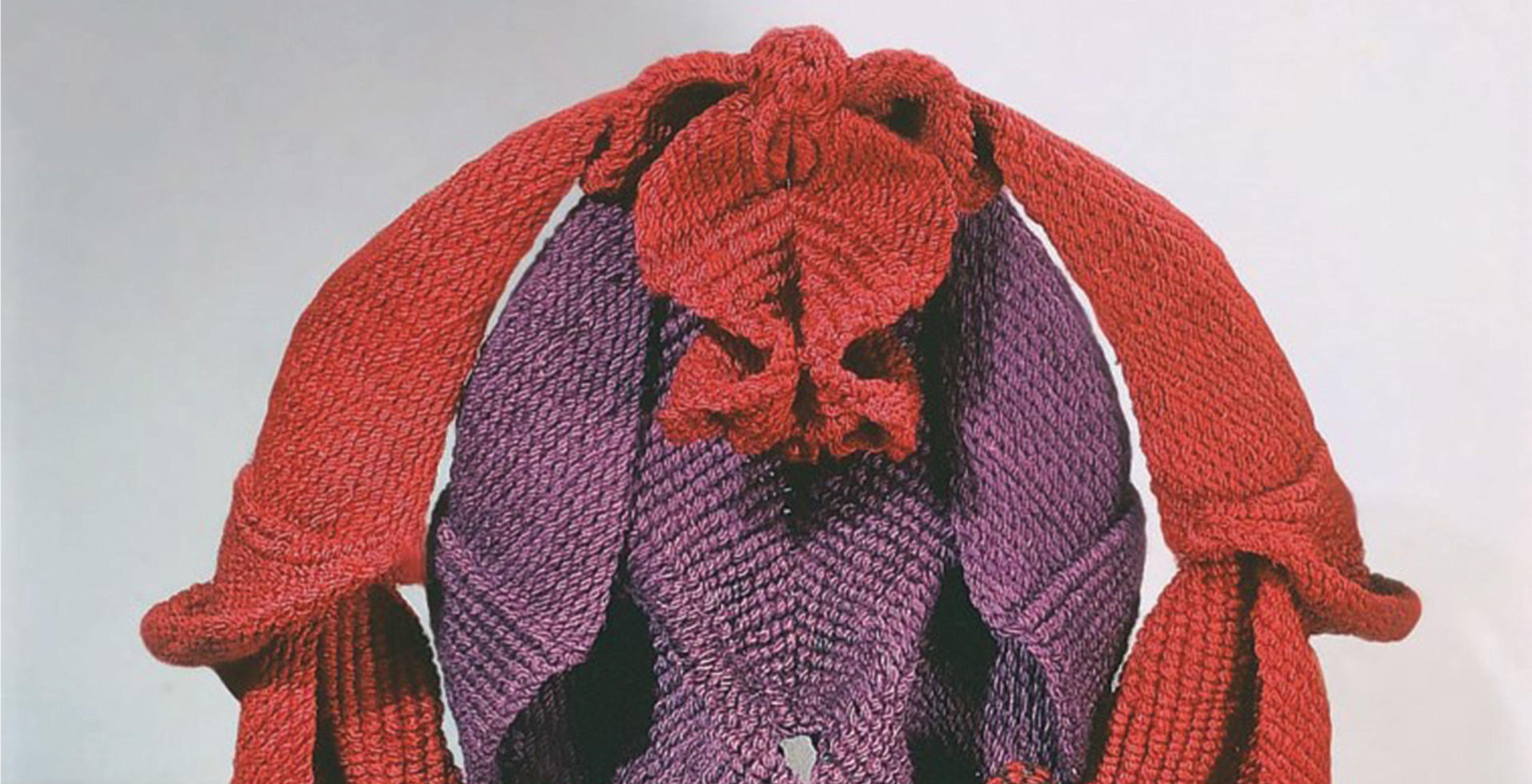 Composite image showing front and side views of Mrinalini Mukherjee’s freestanding fibre red and purple sculpture depicting unfurling forms that resemble female genitalia.