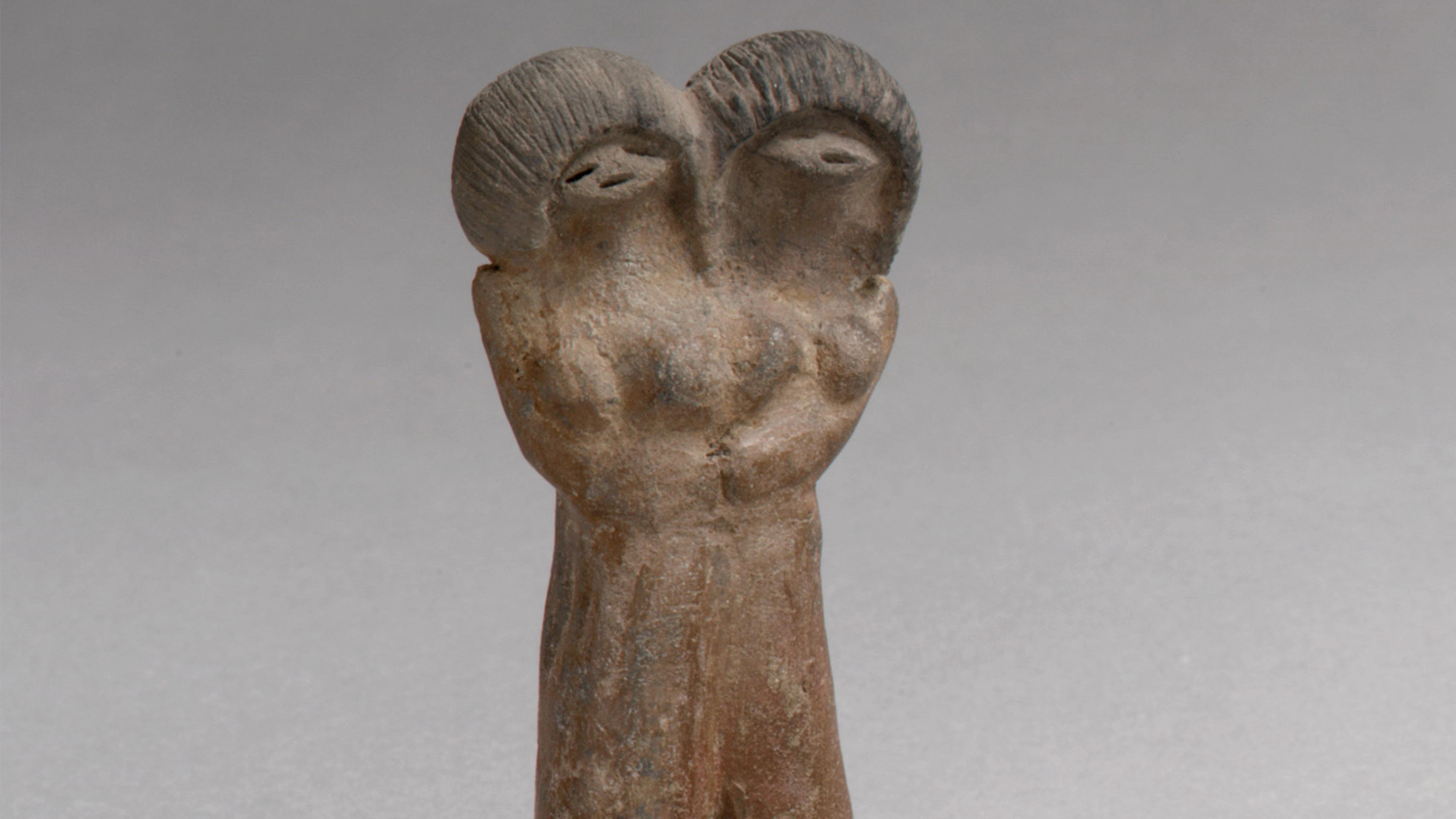 Double-headed ceramic figure