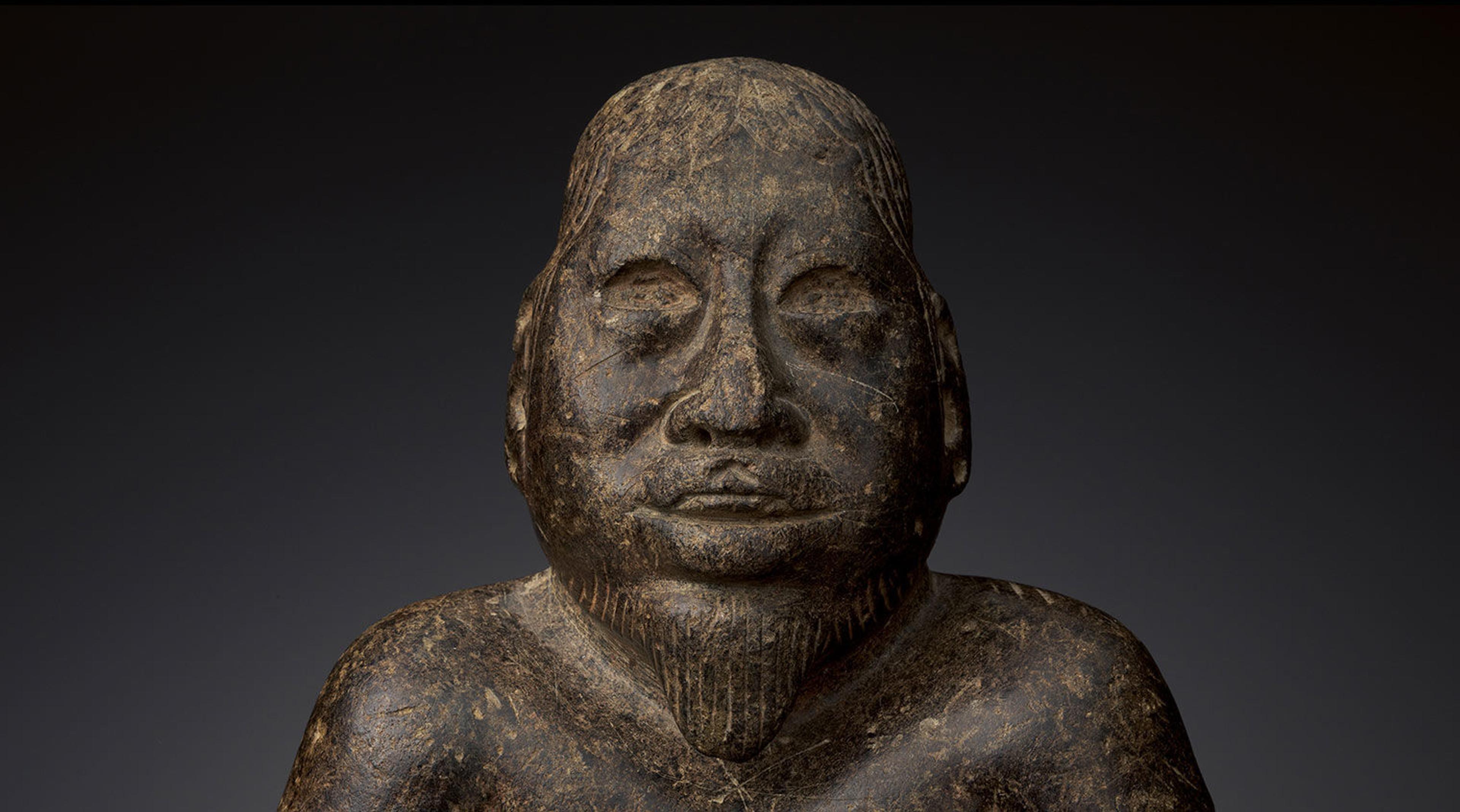 Olmec kneeling figure