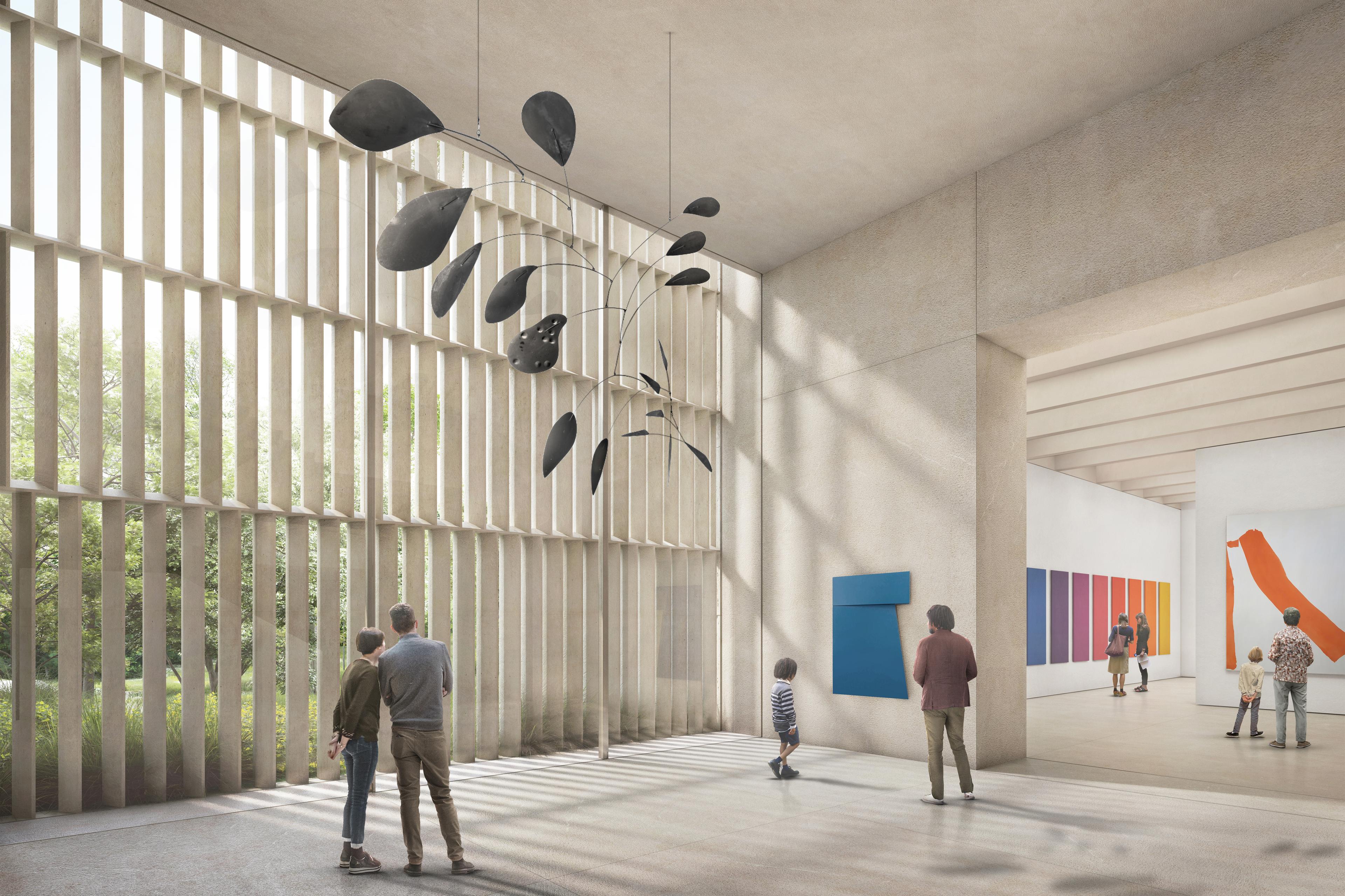 A gallery with slatted walls and a mobile sculpture on the ceiling