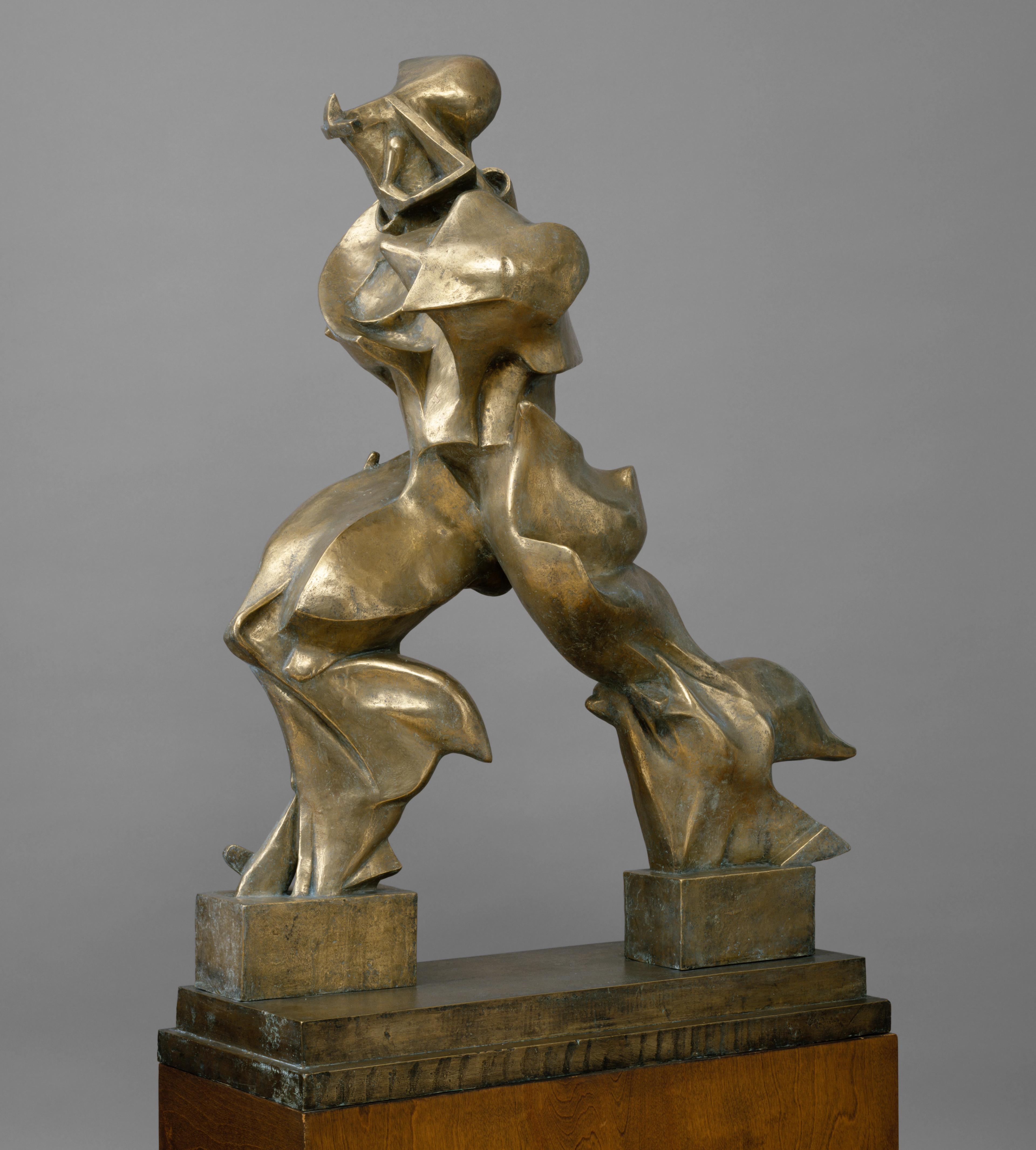 Futurist sculpture of a figure in bronze.
