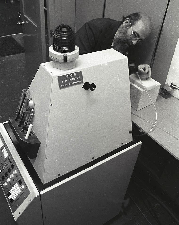 A conservator using the Museum's first X-ray fluorescence spectrometer.