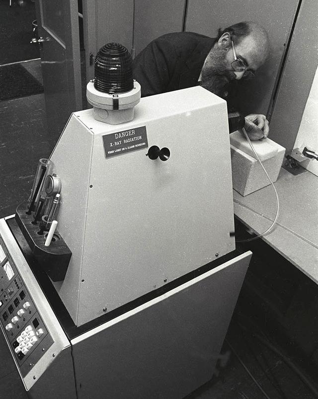 A conservator using the Museum's first X-ray fluorescence spectrometer.